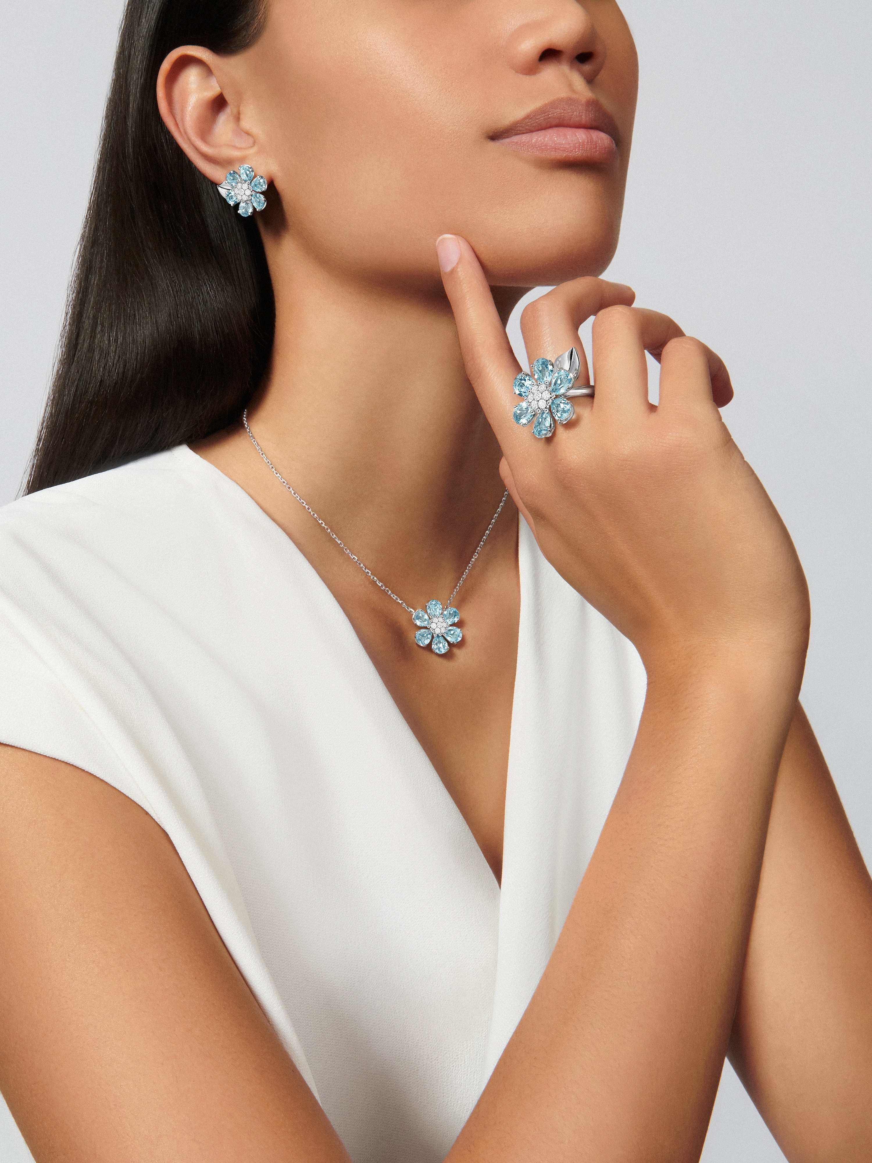 Fleurs d’Hawaï earrings, 18K white gold, Aquamarine:  12 stones,  6.6 carats, Diamond:  14 stones,  0.39 carat, Worn Detail, Jewelry Earrings - Van Cleef & Arpels