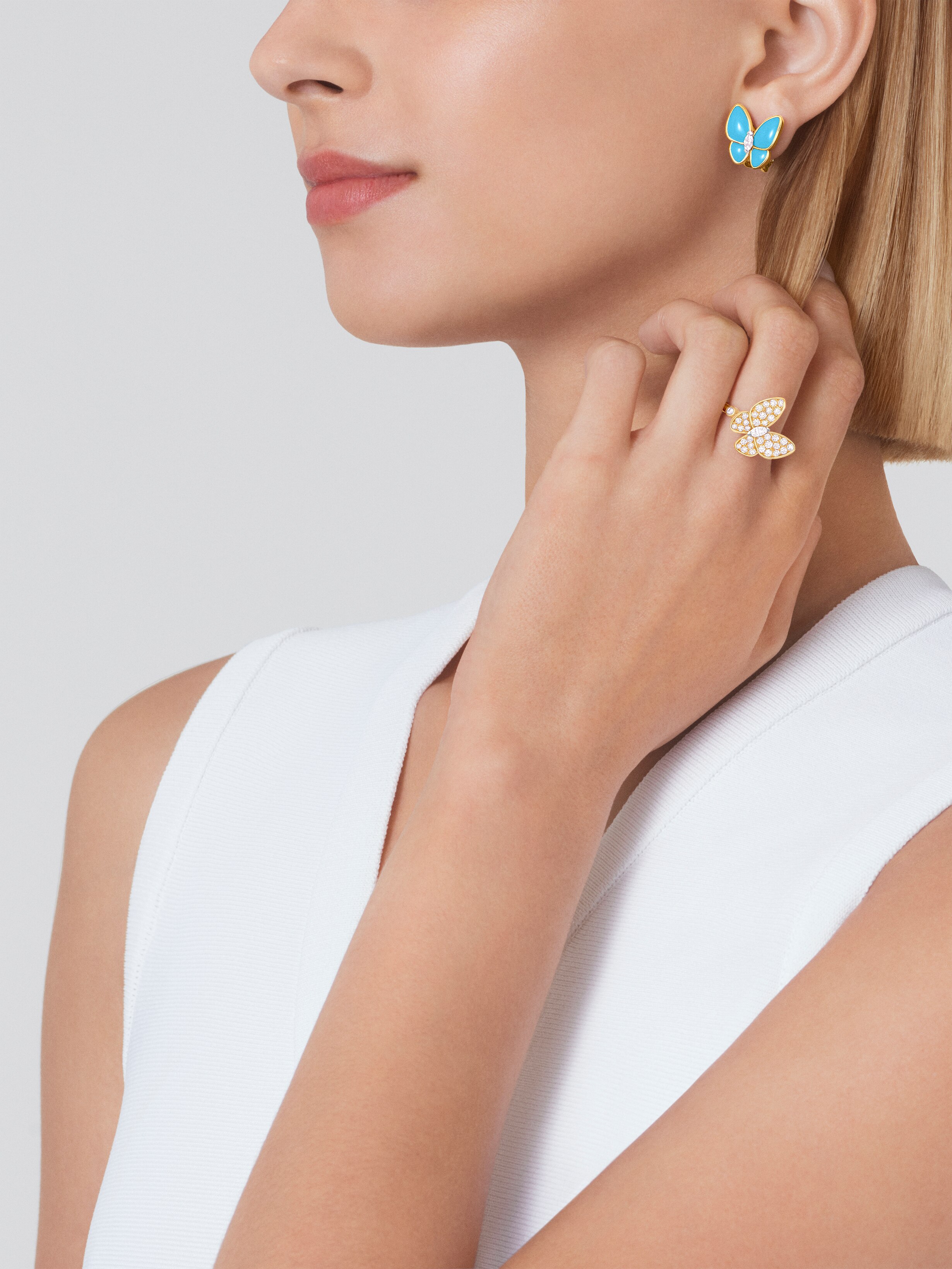 Two Butterfly earrings, 18K yellow gold, 18K white gold, Diamond:  36 stones,  0.99 carat, Turquoise:  4 stones, Worn Detail, Jewelry Earrings - Van Cleef & Arpels