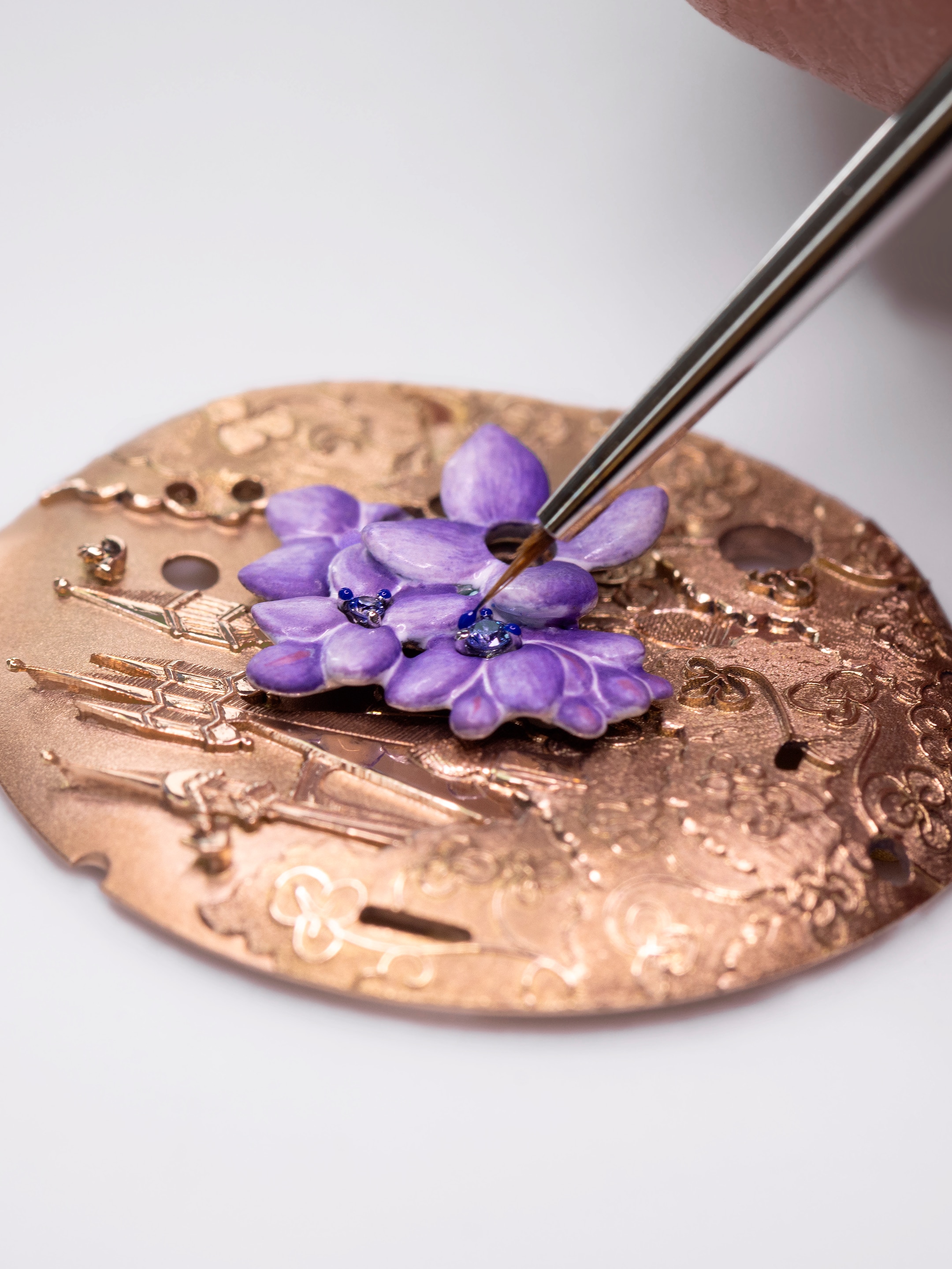 Lady Arpels Belle au Bois Dormant watch. 18K rose gold, diamond, emerald, mandarin garnet, ruby, sapphire. Extraordinary Dials collection, Van Cleef & Arpels.