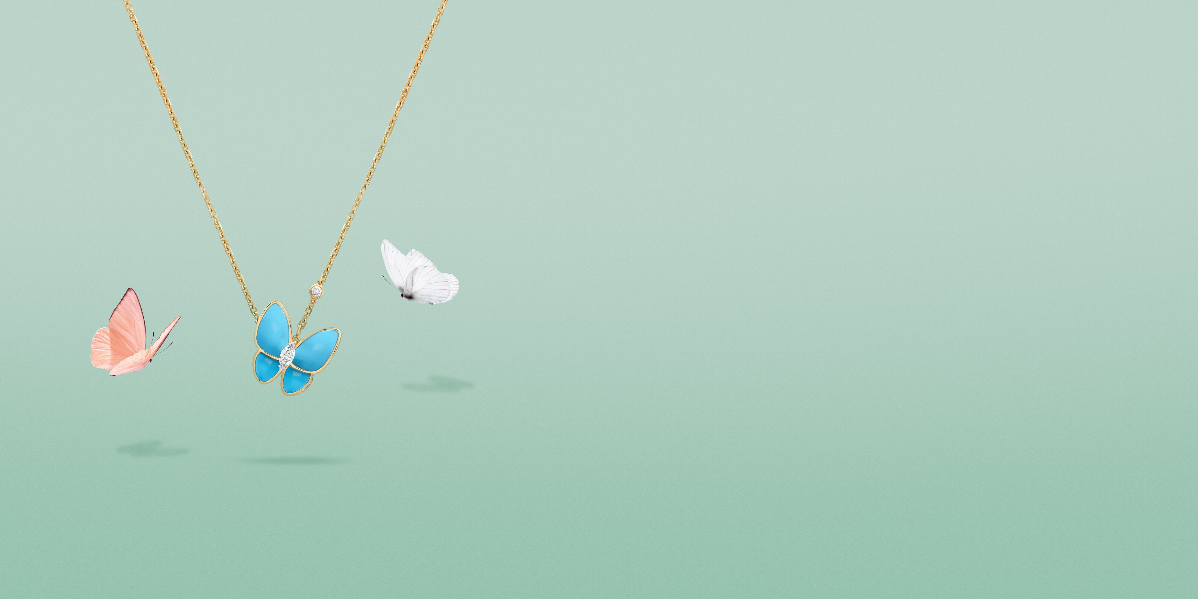 Two Butterfly pendant, 18K yellow gold, turquoise, round diamond, 18K white gold, marquise-cut diamond. Two Butterfly collection, Van Cleef & Arpels