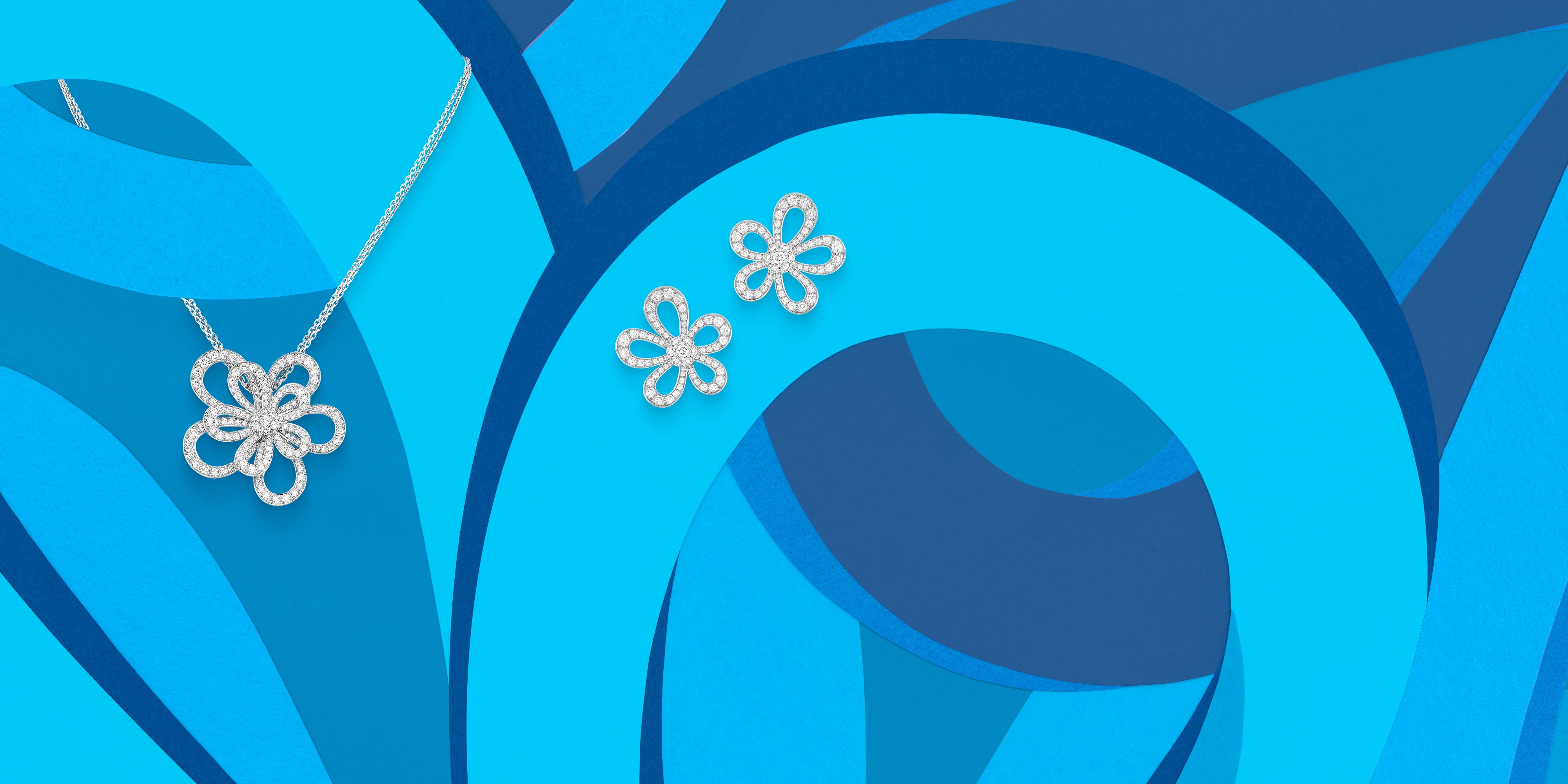 Flowerlace ring, 18K white gold, diamonds. Flowerlace collection, Van Cleef & Arpels