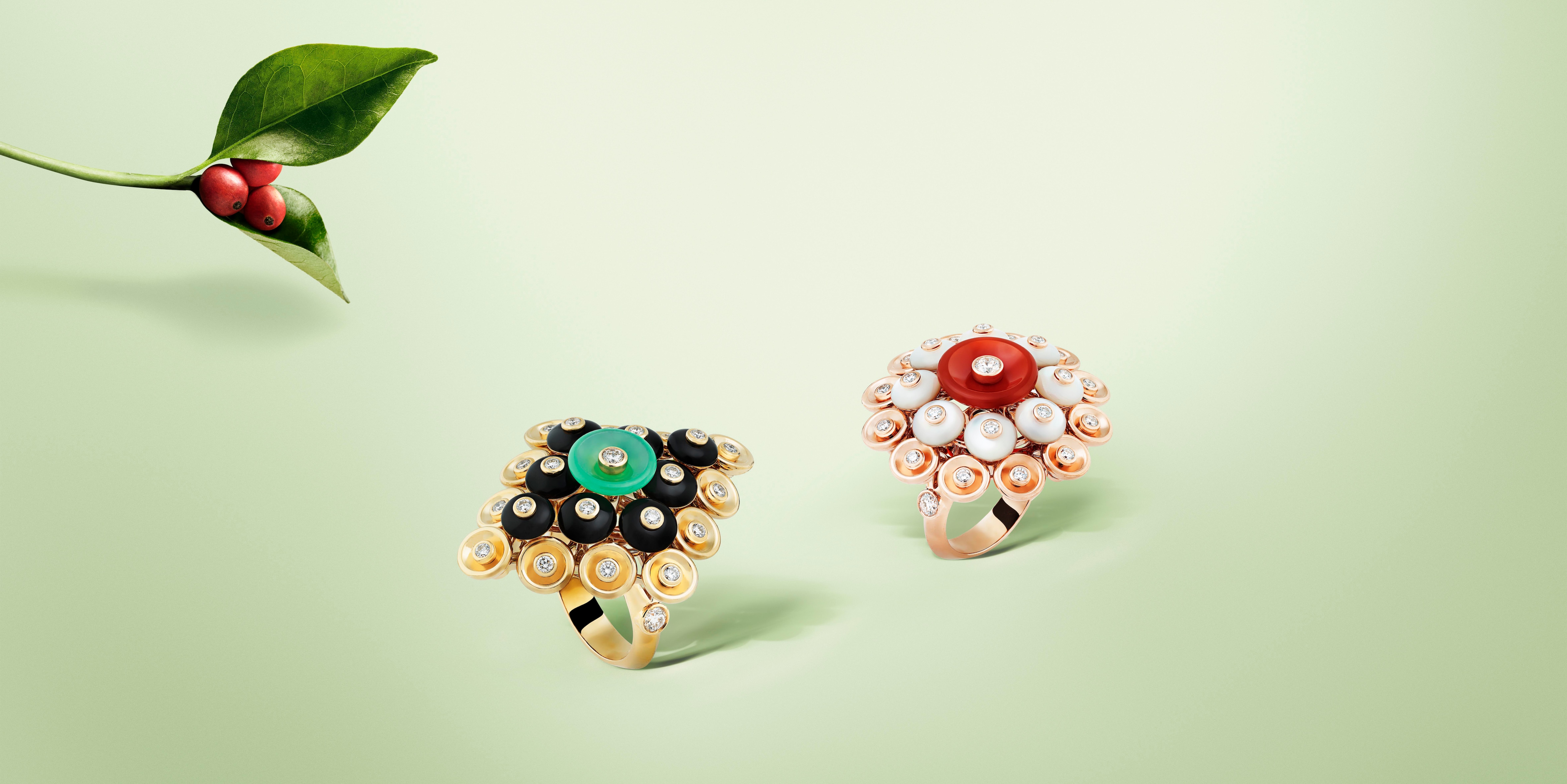 Bouton d’or ring, 18K rose gold, carnelian, white mother-of-pearl, diamonds. Bouton d’or ring, 18K yellow gold, chrysoprase, onyx, diamonds. Bouton d'or collection, Van Cleef & Arpels.