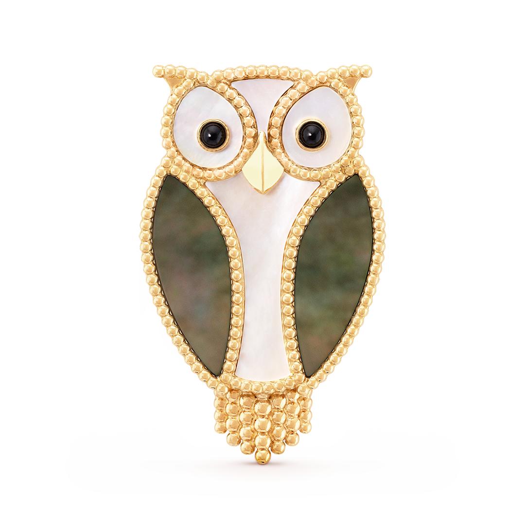 Lucky Animals owl clip, yellow gold, white mother-of-pearl, gray mother-of-pearl, onyx. Lucky Animals collection, Van Cleef & Arpels.