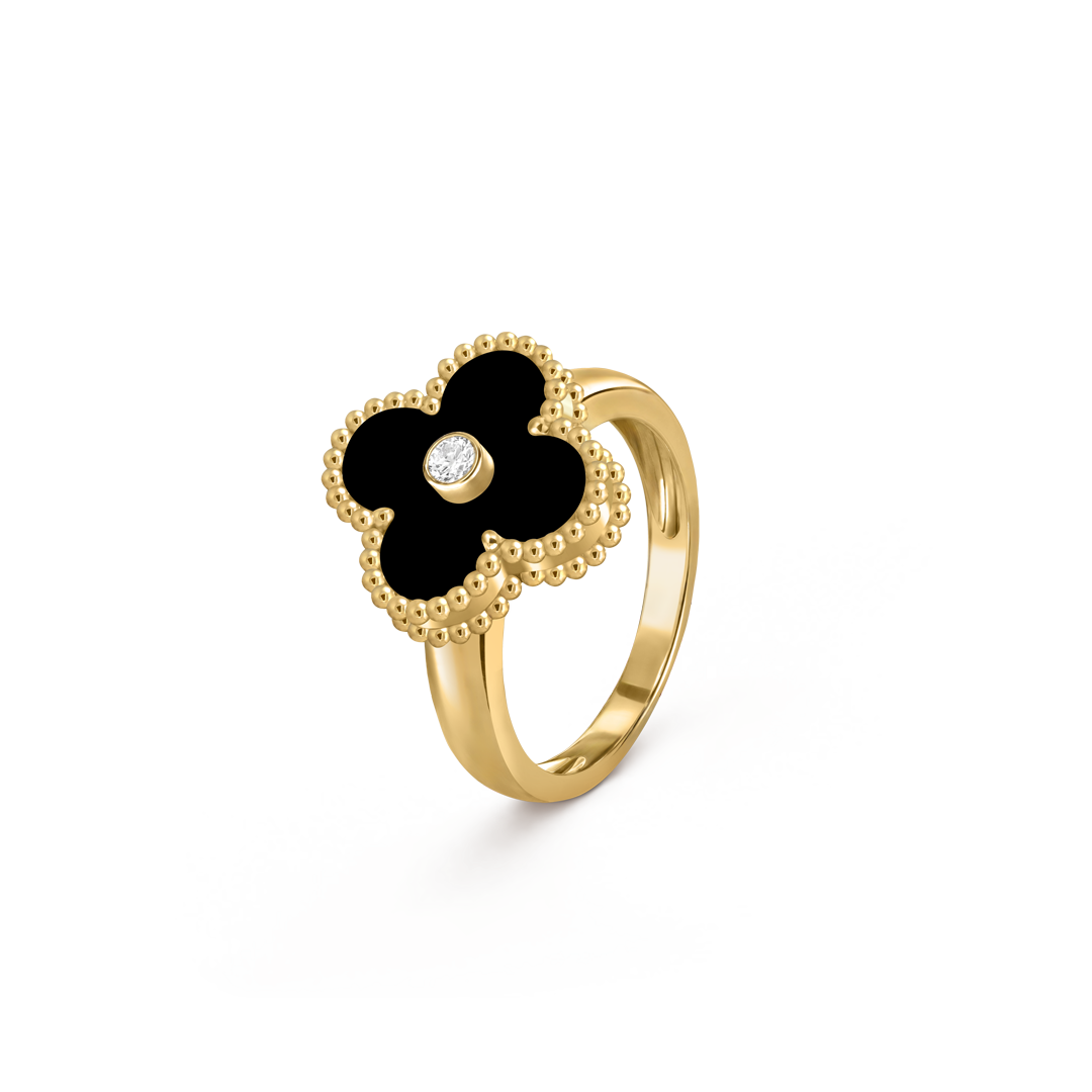 Vintage Alhambra ring, 18K yellow gold, onyx, diamond. Alhambra collection, Van Cleef & Arpels.