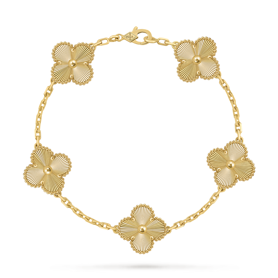 Vintage Alhambra bracelet, 5 motifs, guilloché 18K yellow gold. Alhambra collection, Van Cleef & Arpels.