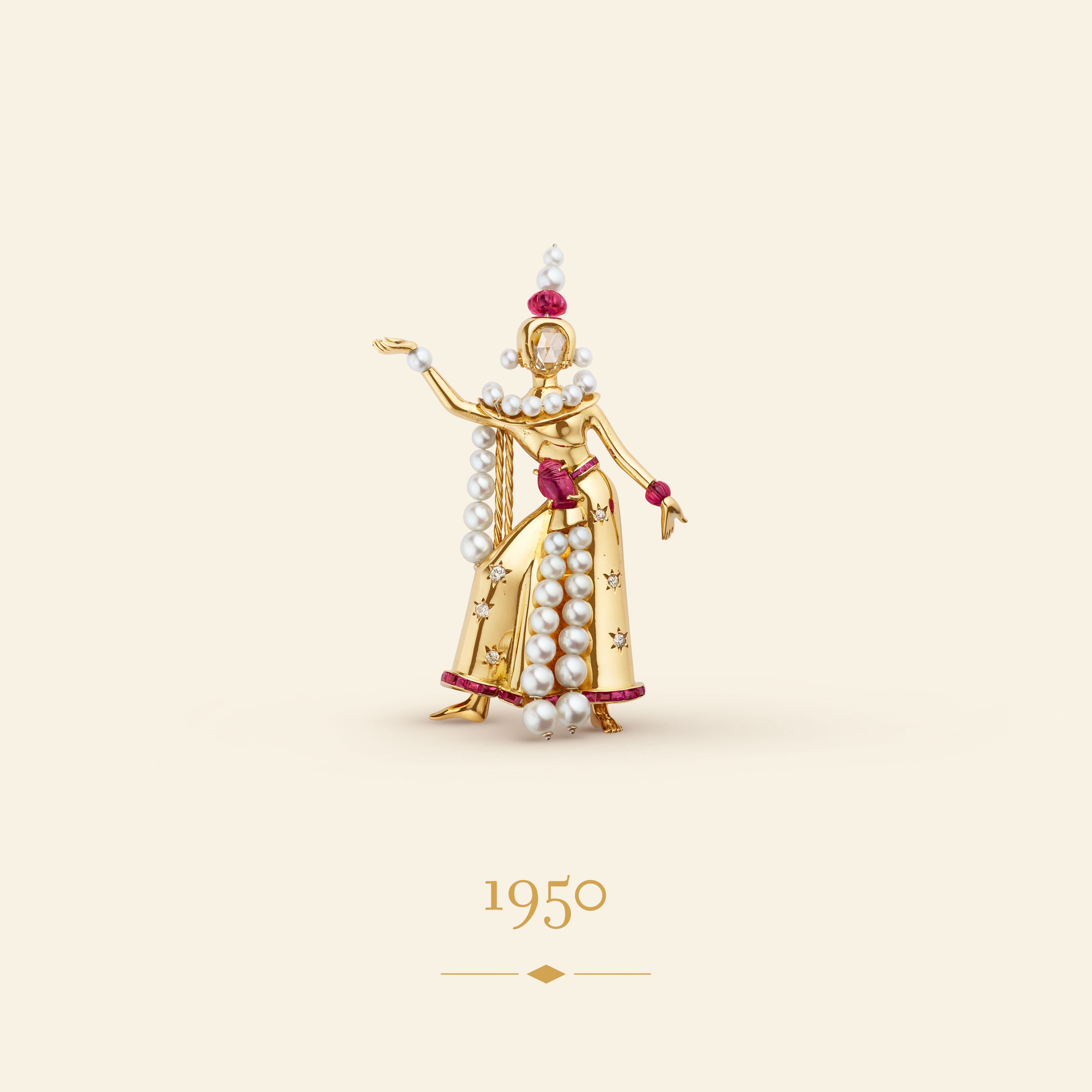 Balinese Dancer clip, 1950​. Yellow gold, white gold, rubies, cultured pearls, diamonds​. Van Cleef & Arpels Collection.