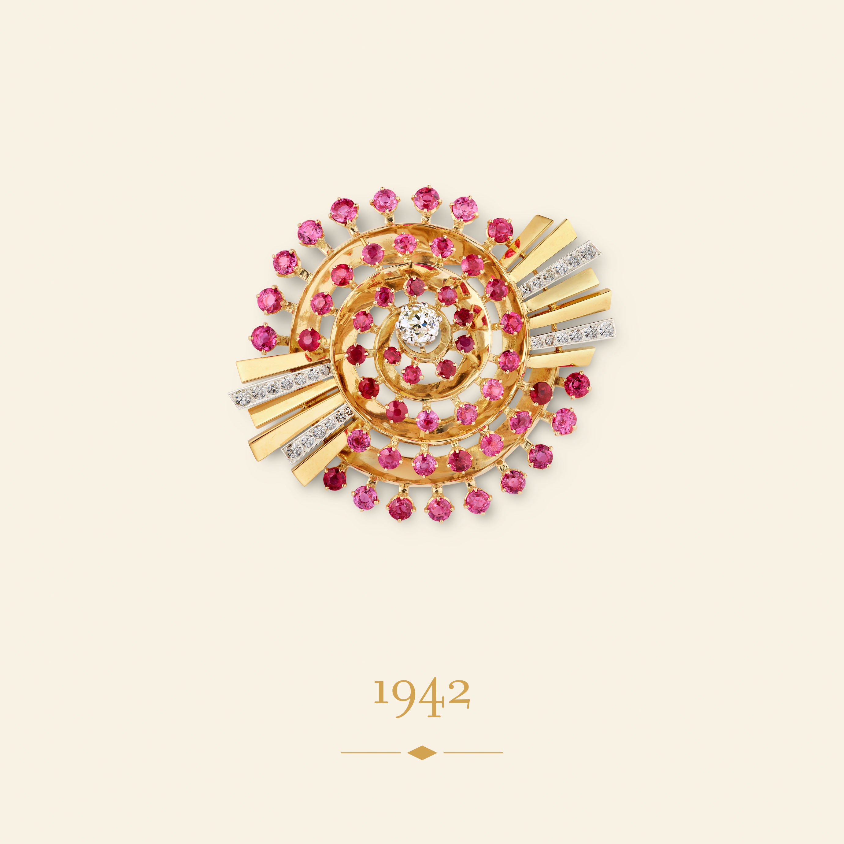 Spiral clip, 1942​. Yellow gold, platinum, rose gold, rubies, diamonds​. Van Cleef & Arpels Collection.