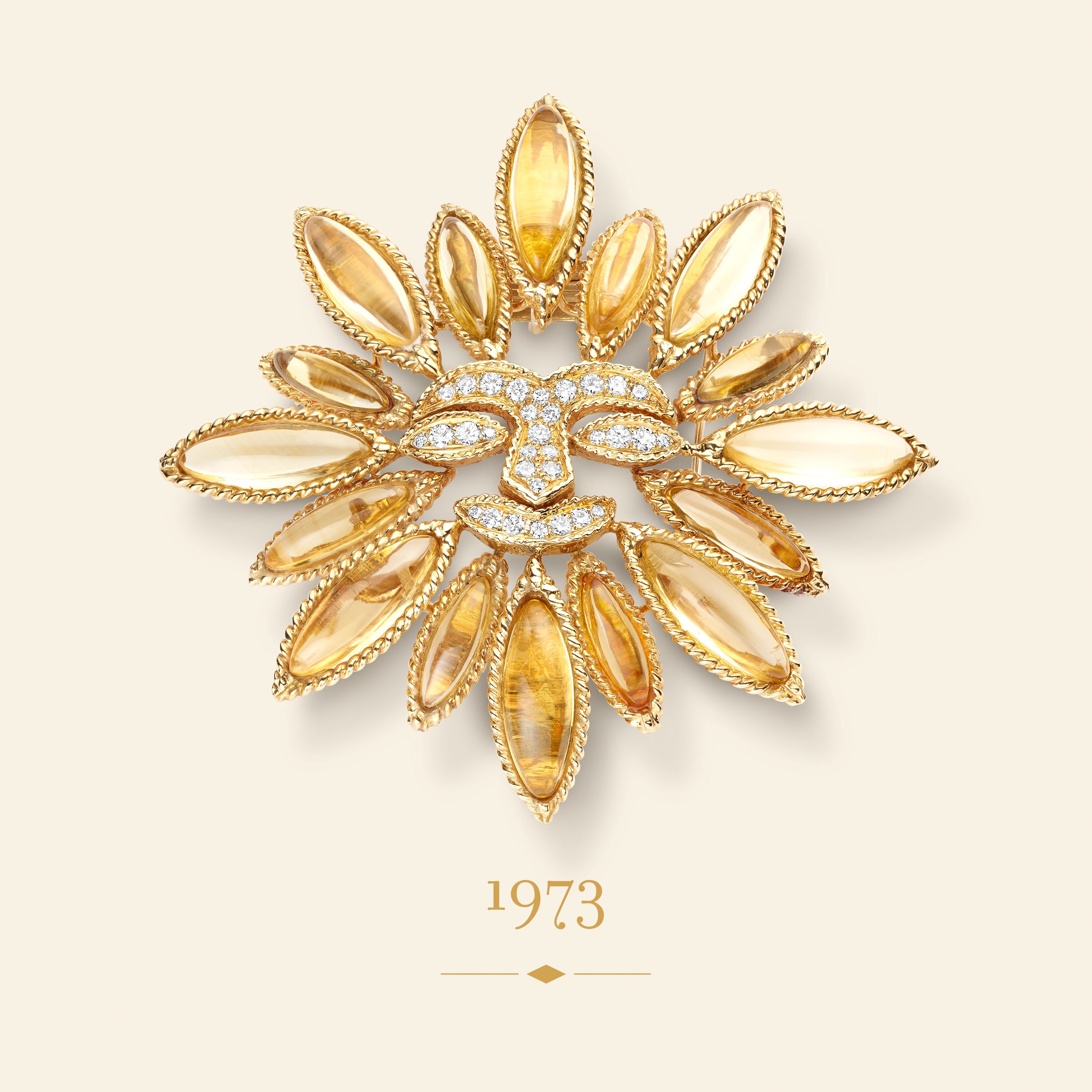 Sun pendant-clip, circa 1973​. Yellow gold, white gold, citrines, diamonds​. Van Cleef & Arpels Collection.