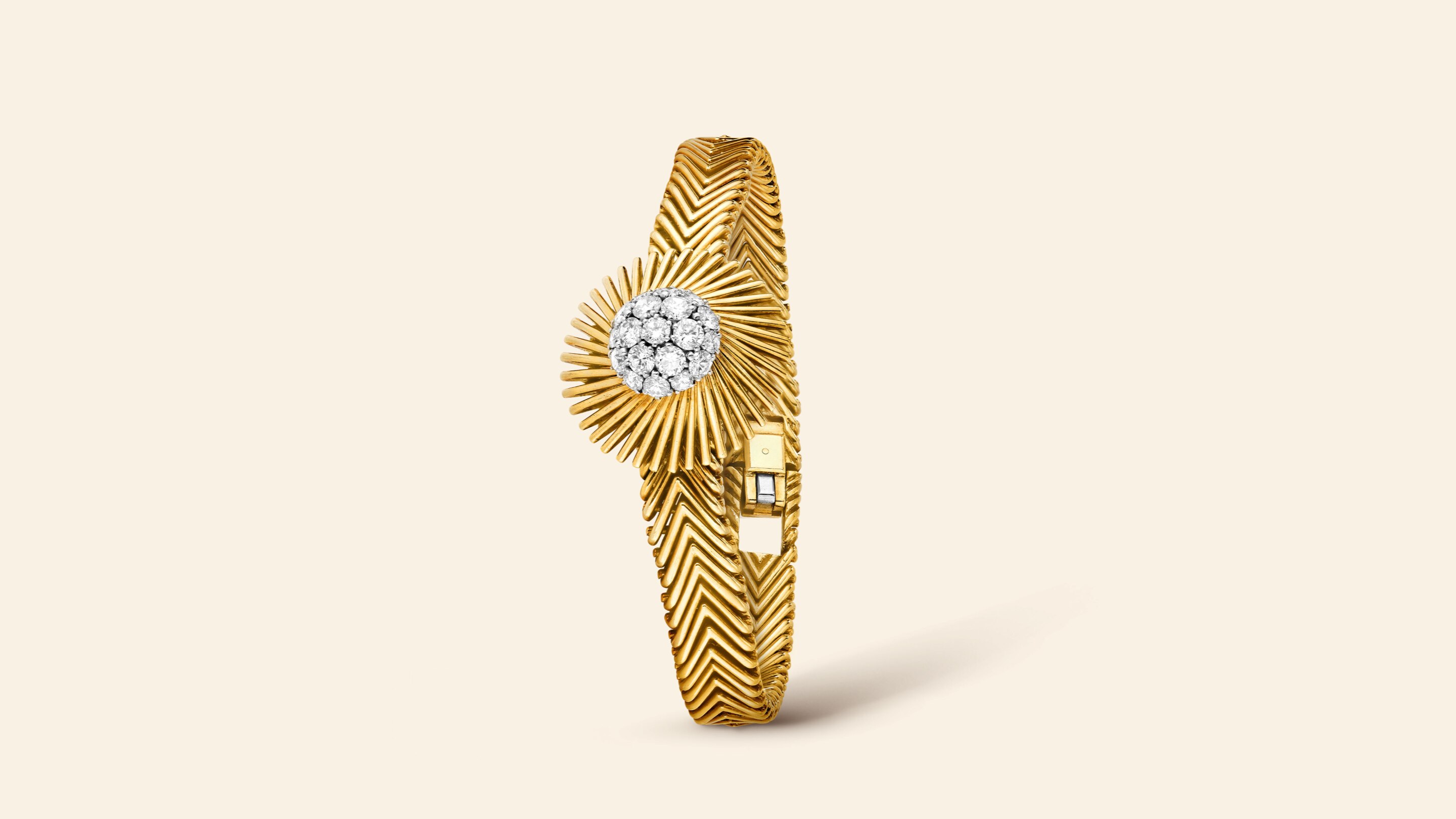 Meteor secret wristwatch, 1959​. Yellow gold, platinum, diamonds​. Van Cleef & Arpels Collection​.