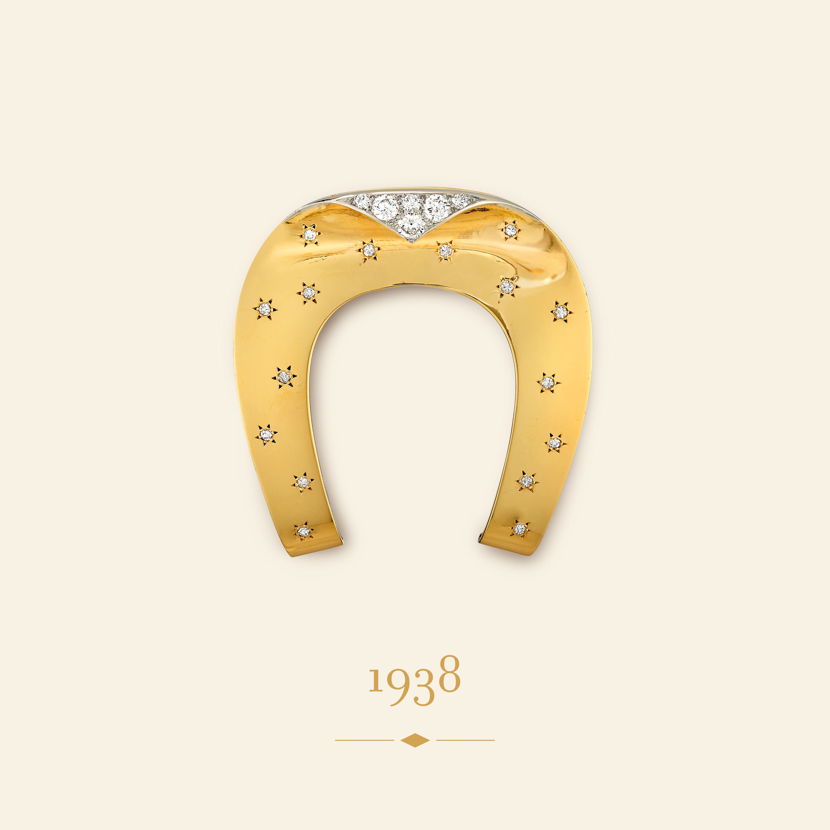 Spilla Fer à cheval, 1938. Oro giallo, platino, diamanti. Collezione Van Cleef & Arpels.