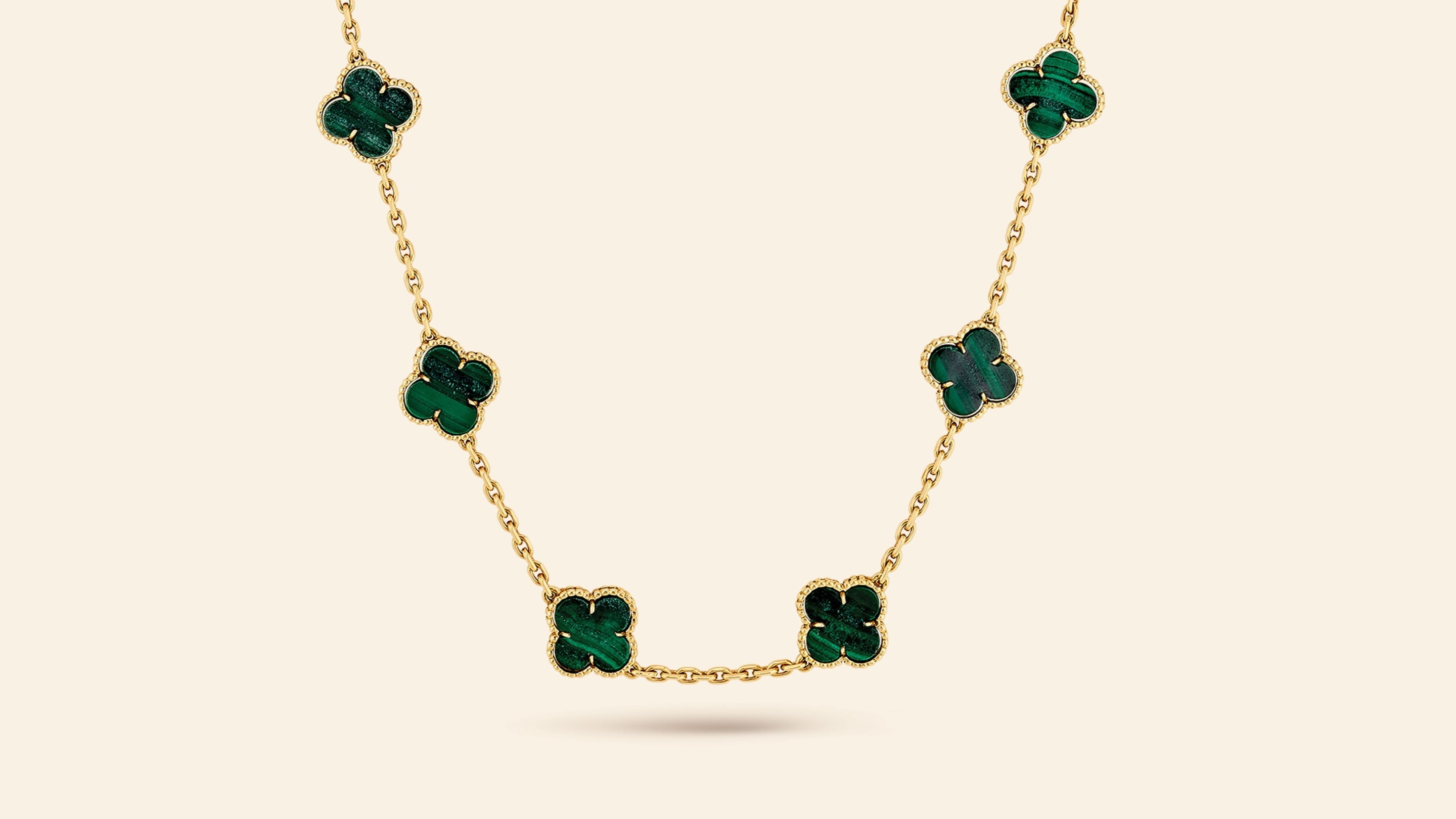 Alhambra long necklace, 1973​. Yellow gold, malachite​. Van Cleef & Arpels Collection​.