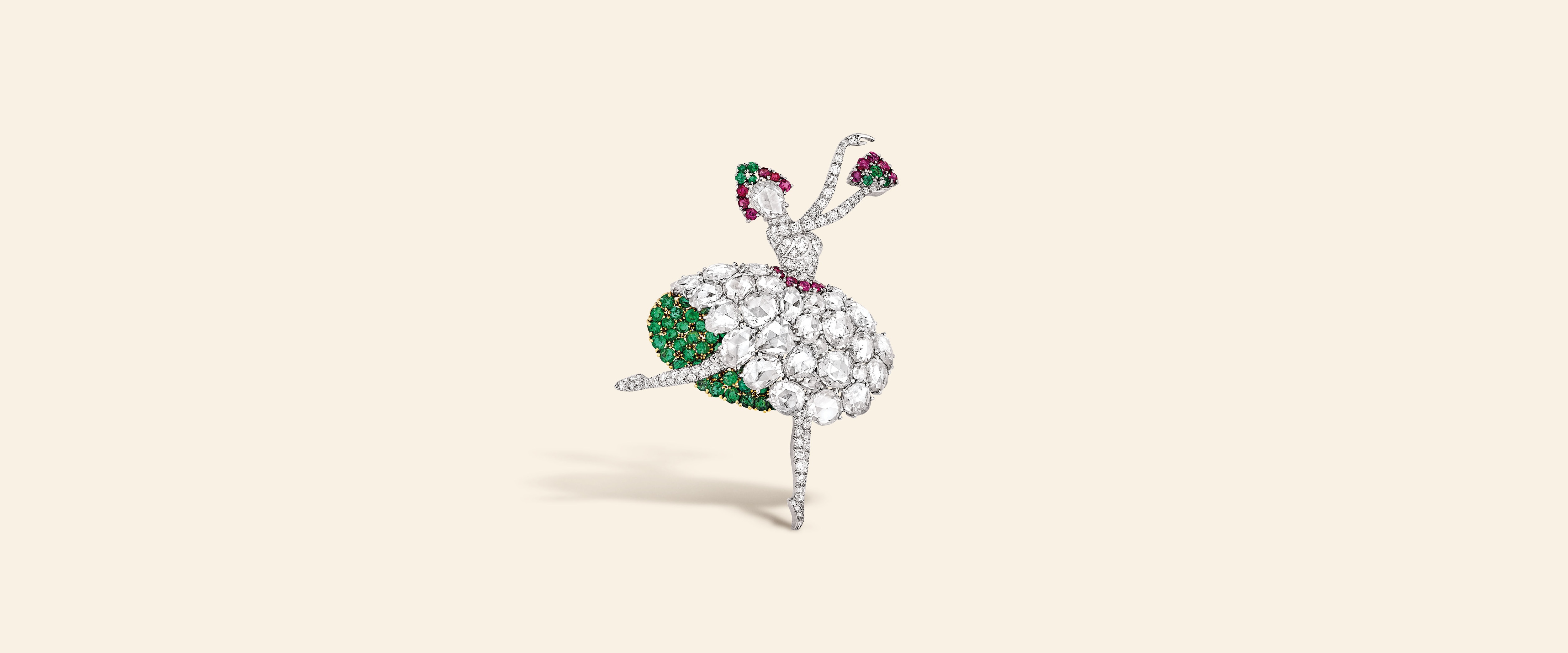 Dancer clip, 1941​. Platinum, yellow gold, emeralds, rubies, diamonds​. Van Cleef & Arpels Collection.