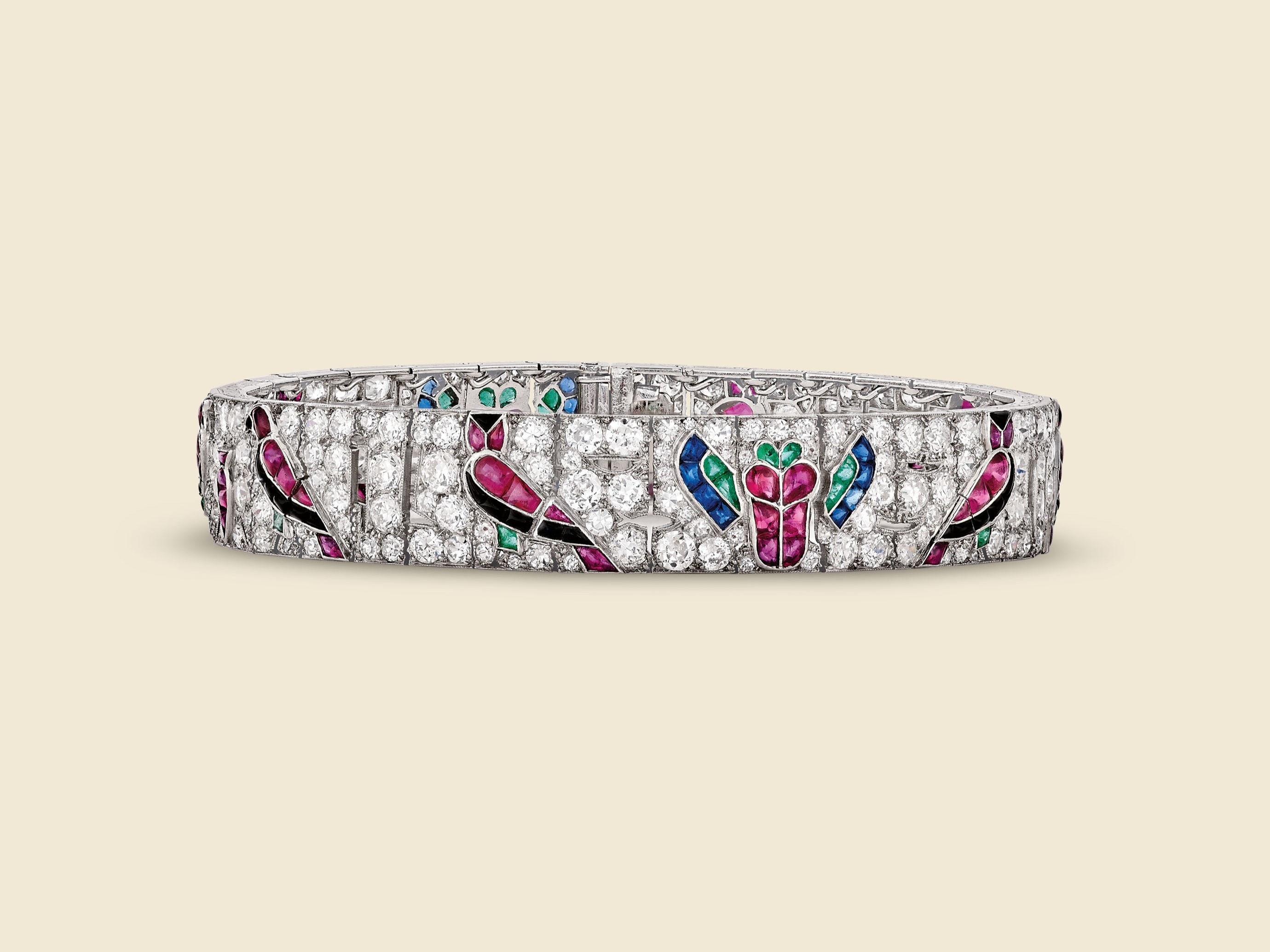 Egyptian Pattern bracelet, 1924. Platinum, emeralds, rubies, sapphires, onyx, diamonds. Van Cleef & Arpels Collection.