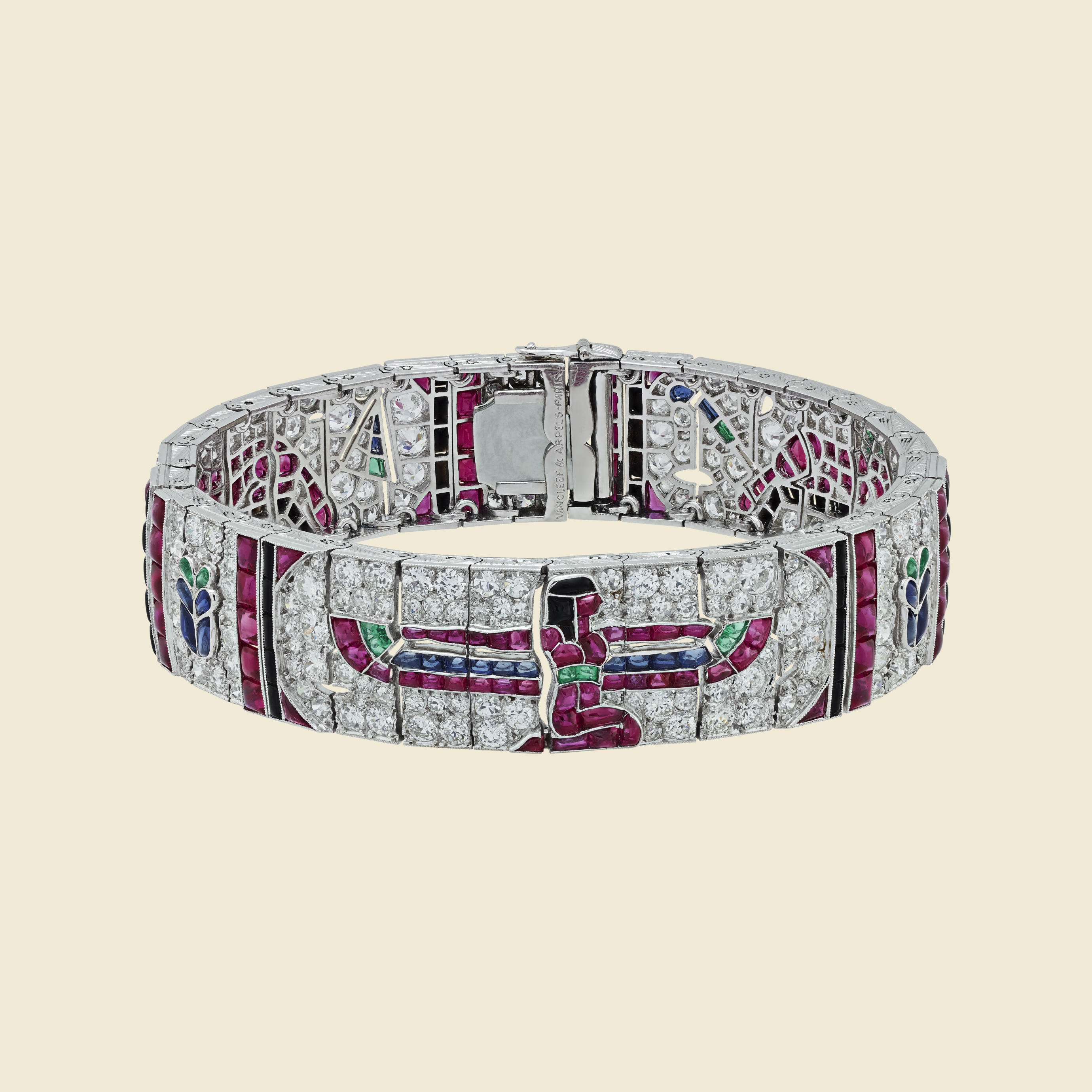 Egyptian bracelet, 1924, platinum, sapphires, rubies, emeralds, onyx, diamonds.Van Cleef & Arpels Collection.