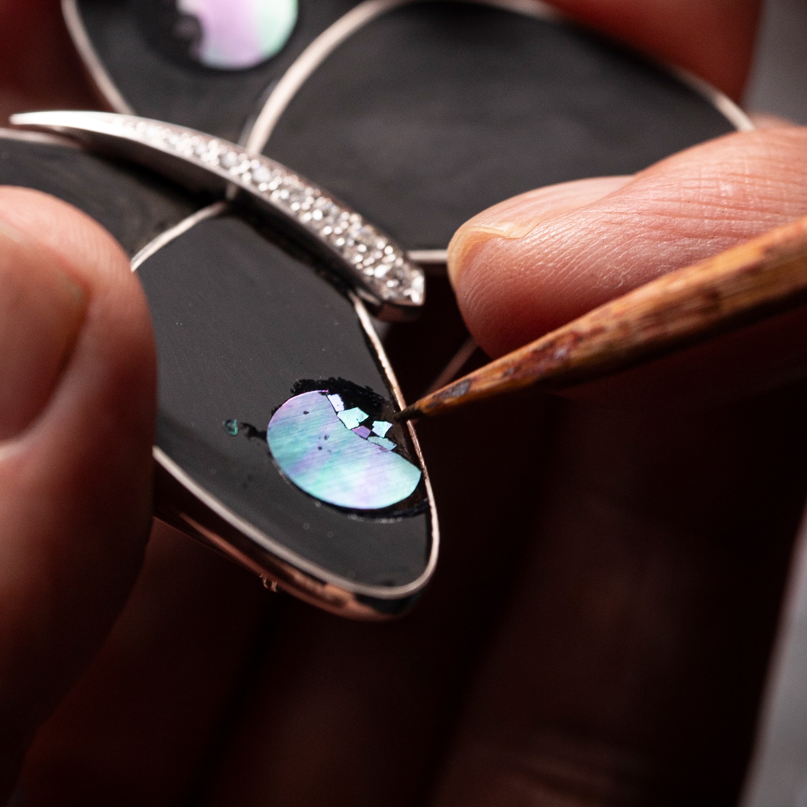 raden: Technique in which linings of mother-of-pearl are cut into designs and inserted into the surface of the lacquerware.