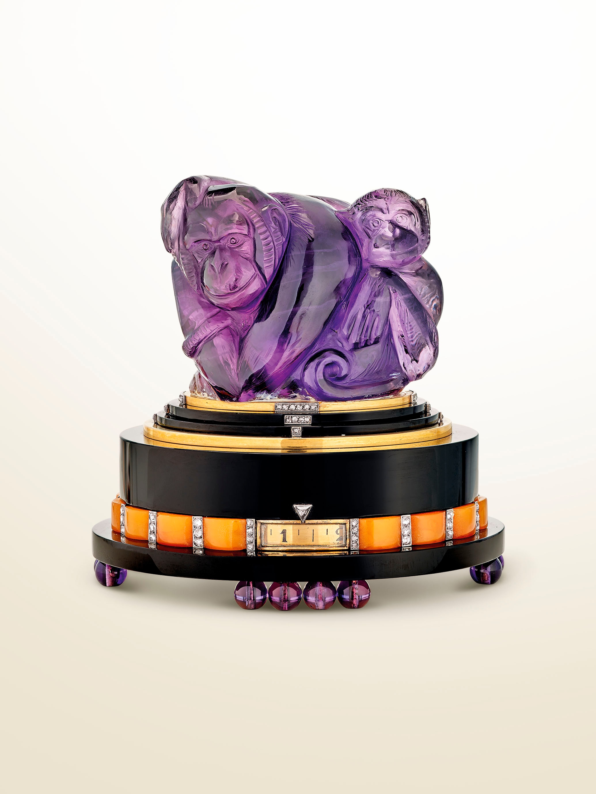 Clock, 1926. Platinum, yellow gold, amethysts, onyx, amber, diamonds. Van Cleef & Arpels Collection.