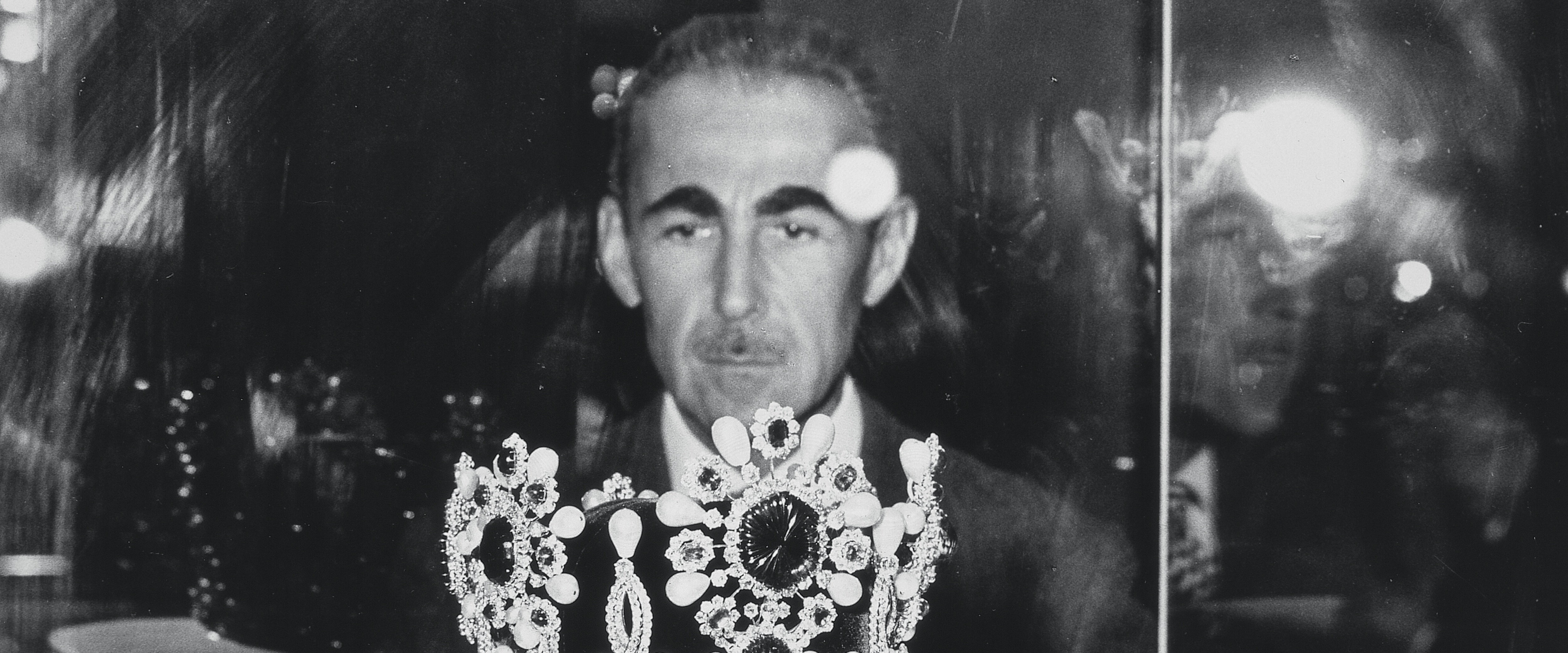 Pierre Arpels looking at the crown of the Impress of Iran, created by Van Cleef & Arpels, 1967. Van Cleef & Arpels Archives.
