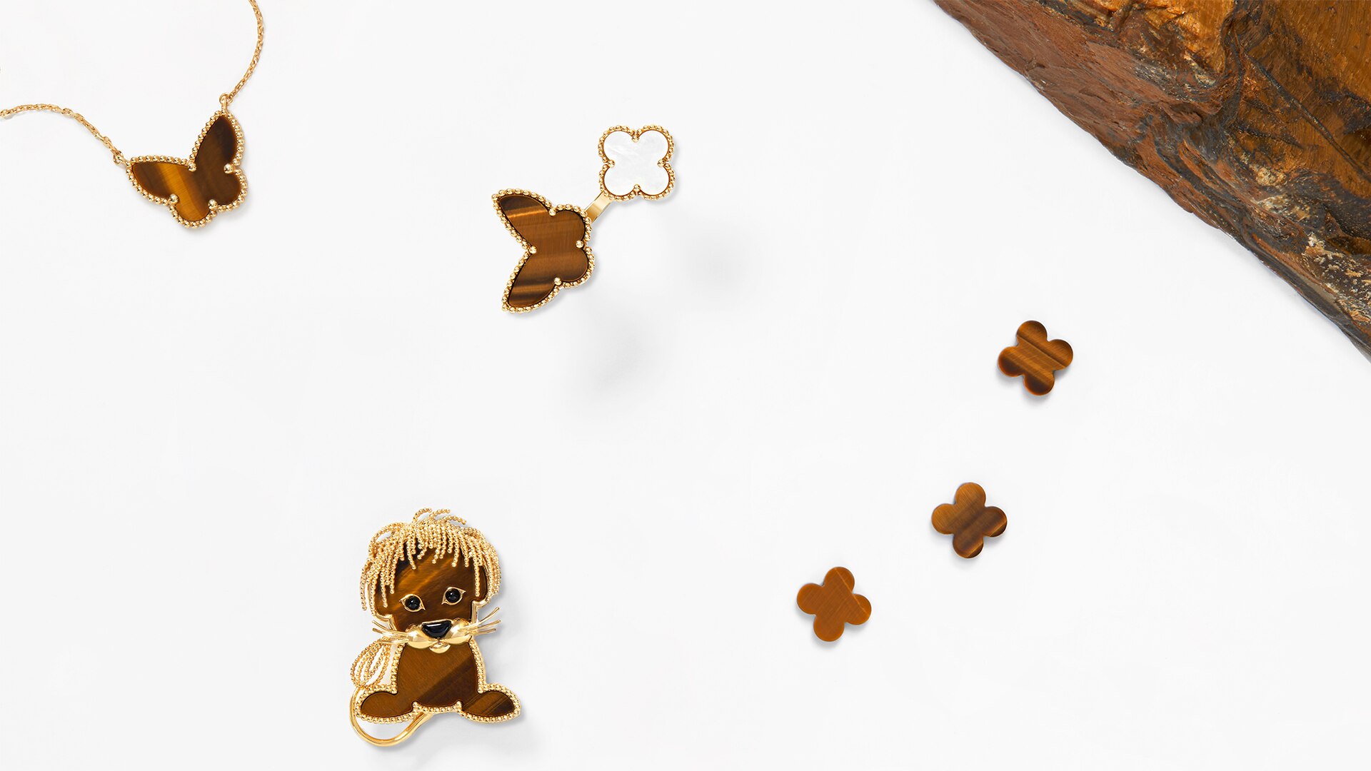 Assembling the jewelry motif, Lucky Animals Lion clip, yellow gold gold, tiger eye, onyx, Van Cleef & Arpels