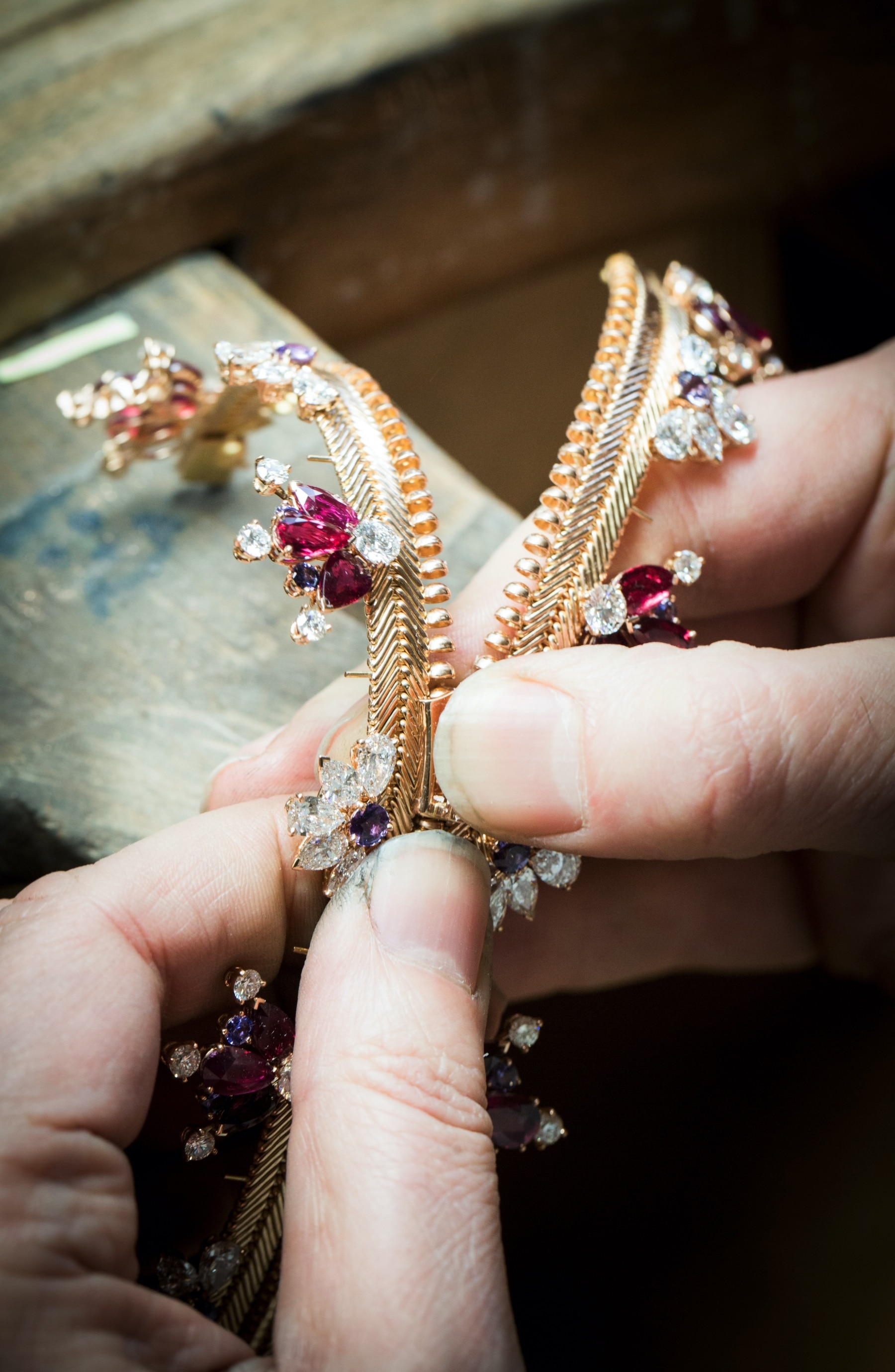 AN ICONIC RETRO GOLD, RUBY AND DIAMOND 'ZIP' NECKLACE, VAN CLEEF & ARPELS