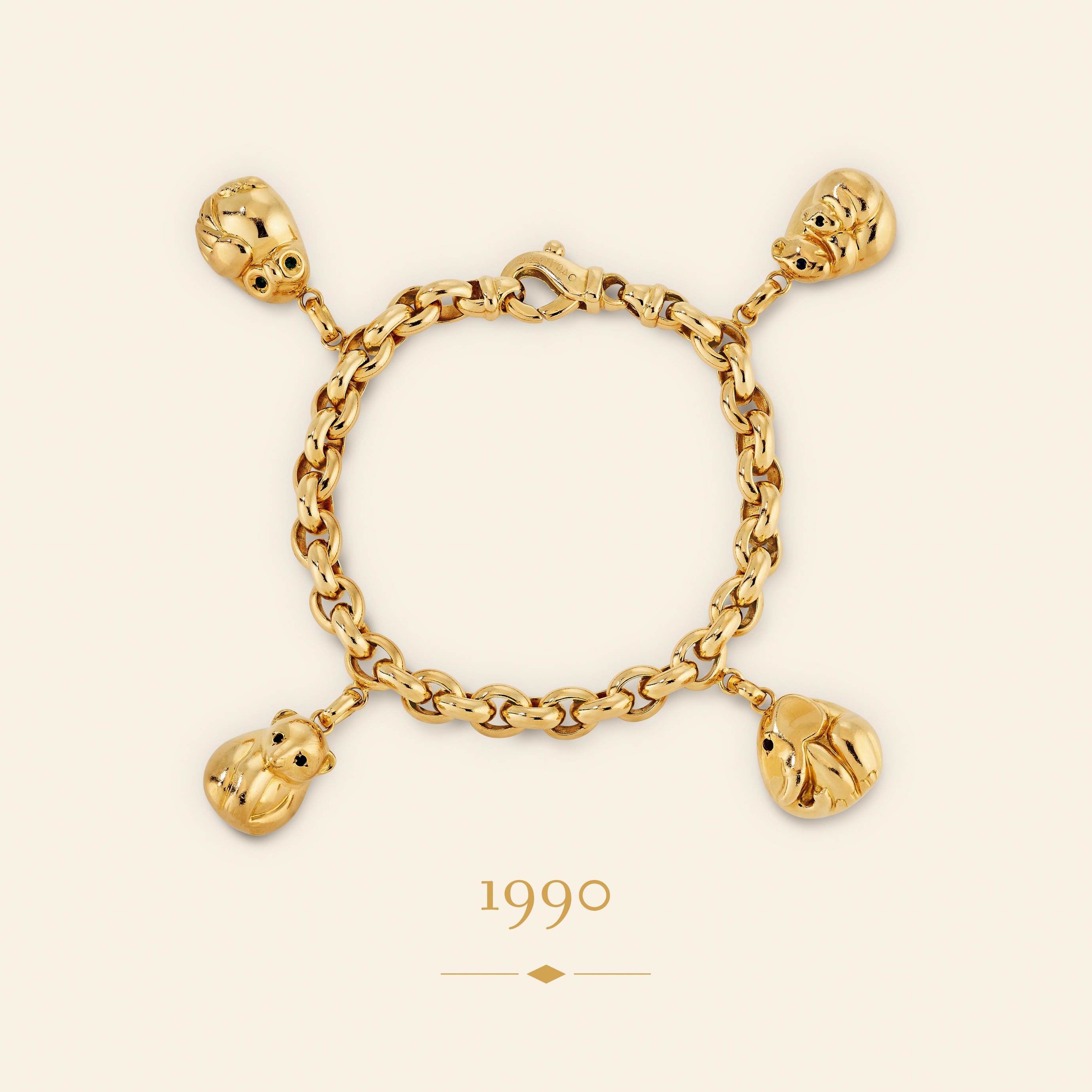 Jungle手镯，约1990年。黄K金，祖母绿，红宝石，蓝宝石。Van Cleef & Arpels梵克雅宝典藏。