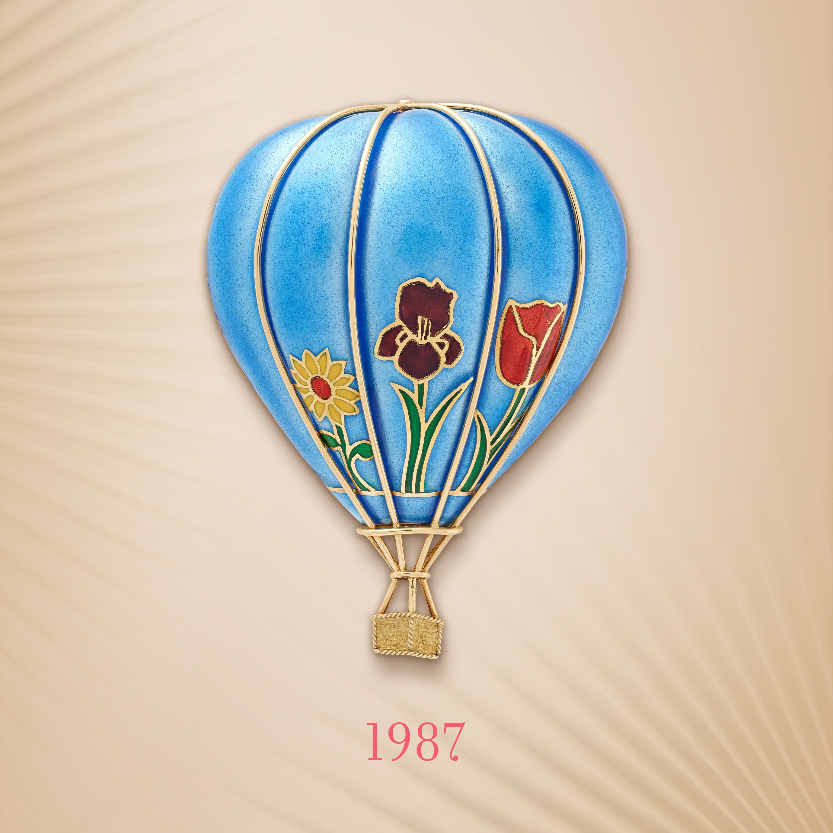 Balloon clip, 1987. 18K yellow gold, 18K white gold, enamel. Van Cleef & Arpels Collection.