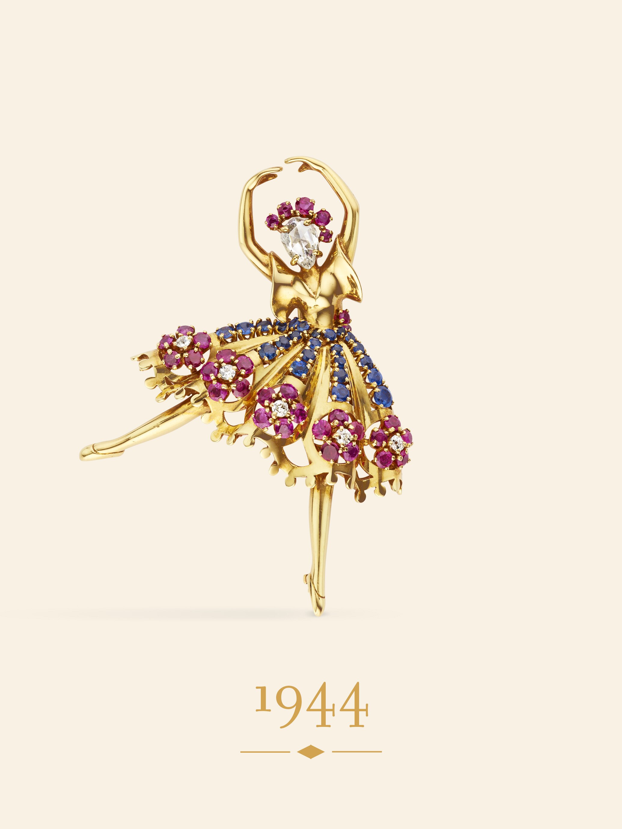 مشبك دانسر، 1944. ذهب أصفر، ياقوت، سافير، ماس. مجموعة دار فان كليف أند آربلز.