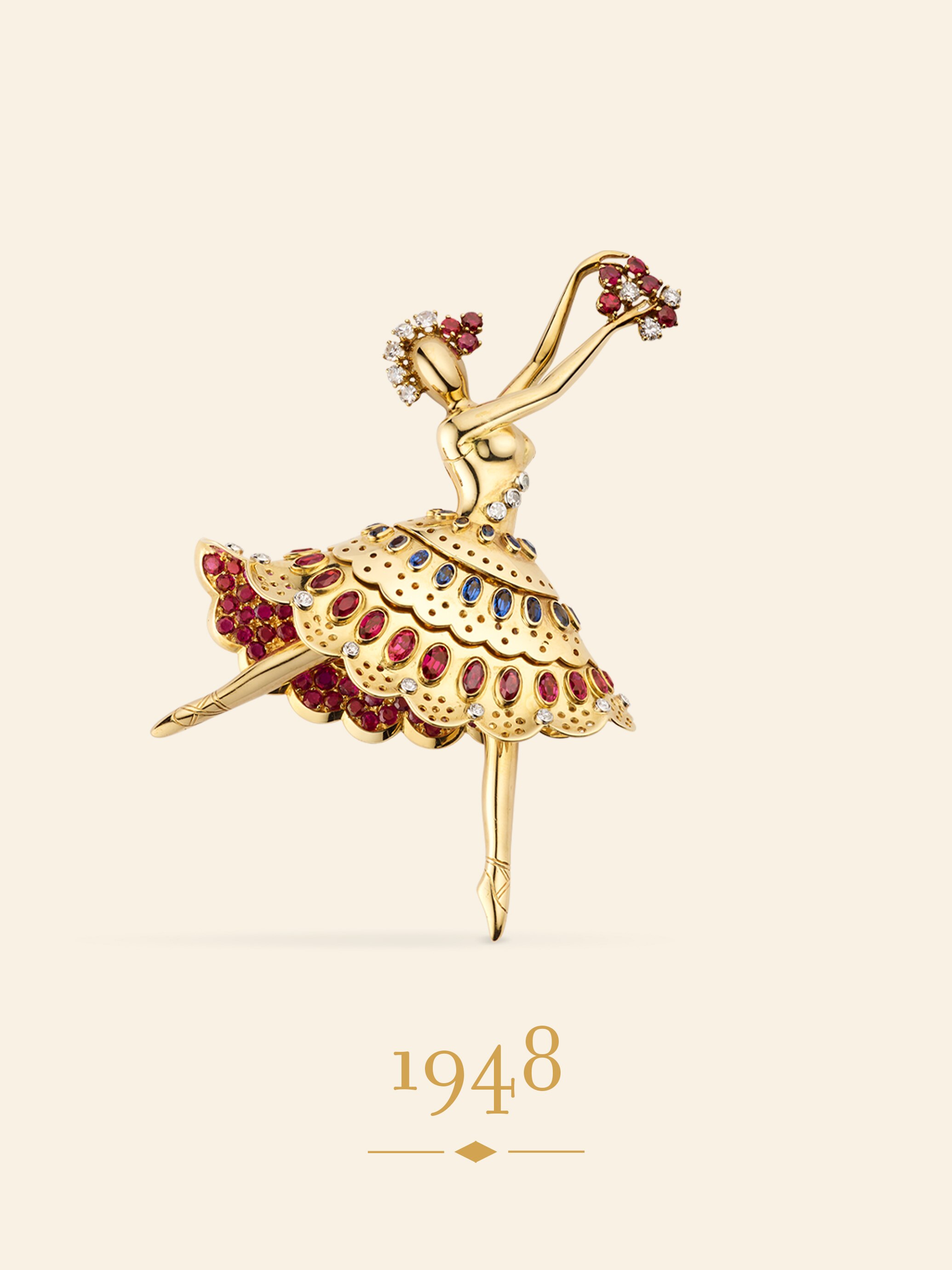 مشبك دانسر، 1948. ذهب أصفر، بلاتين، ياقوت، سافير، ماس. مجموعة دار فان كليف أند آربلز.