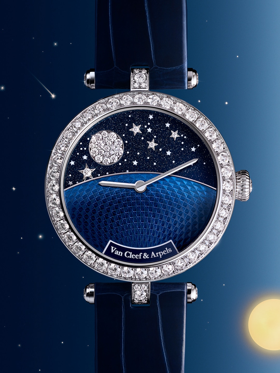 Lady Jour Nuit watch. 18K white gold, 18K yellow gold, blue aventurine, guilloché blue-painted white mother-of-pearl, diamonds. Mechanical self-winding movement equipped with 24h module. Poetic Complications® collection, Van Cleef & Arpels.
