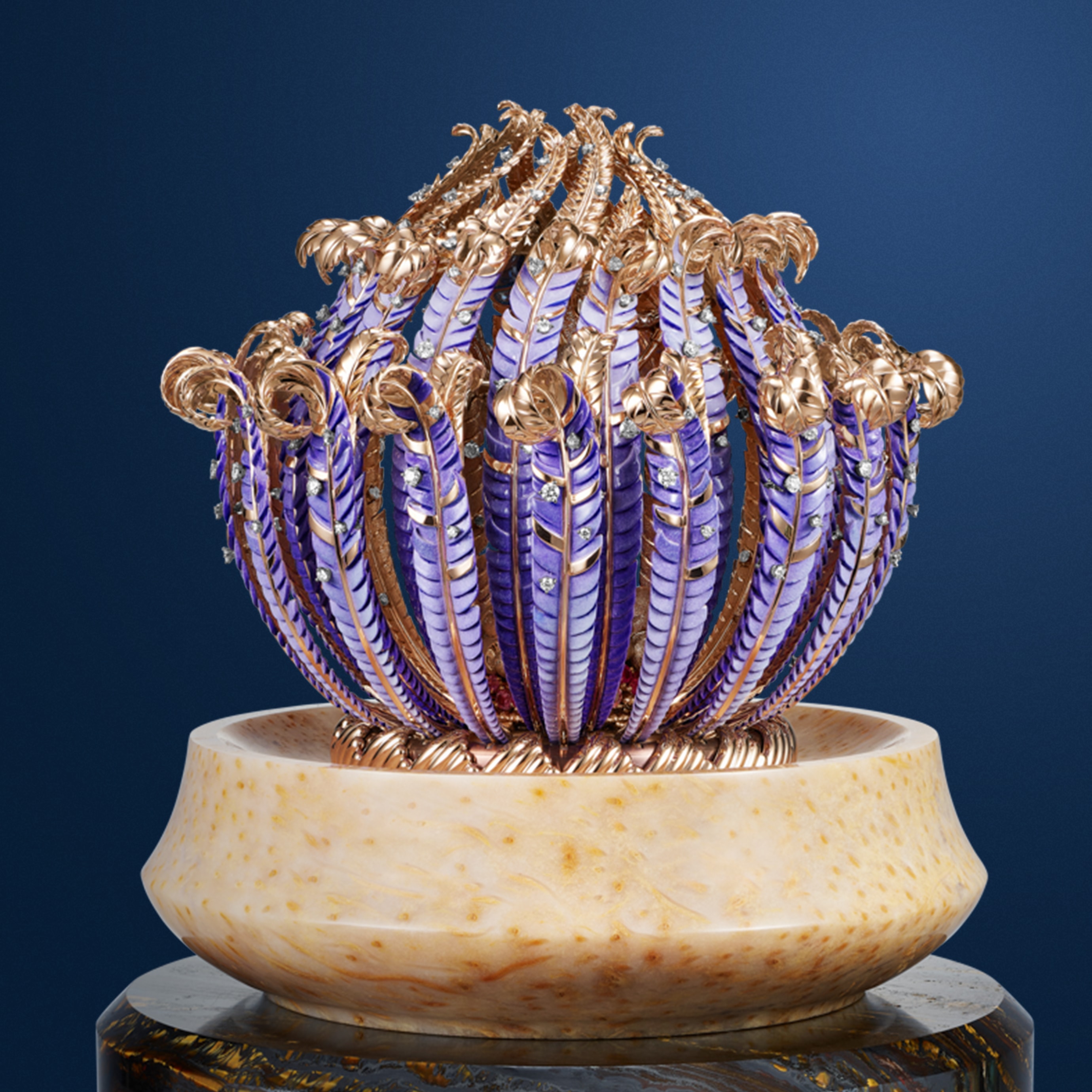 Naissance de l’Amour automaton, rose, white and yellow gold, pink sapphires, diamonds, iron eye, petrified palm tree, enamel, lacquer, ebony, leather, aluminium, steel. Automaton and mechanical movements, 12-hour function on a 360-degree rotating ring, 8-day power reserve, on-demand animation with a melody. Extraordinary Objects™ collection, Van Cleef & Arpels.