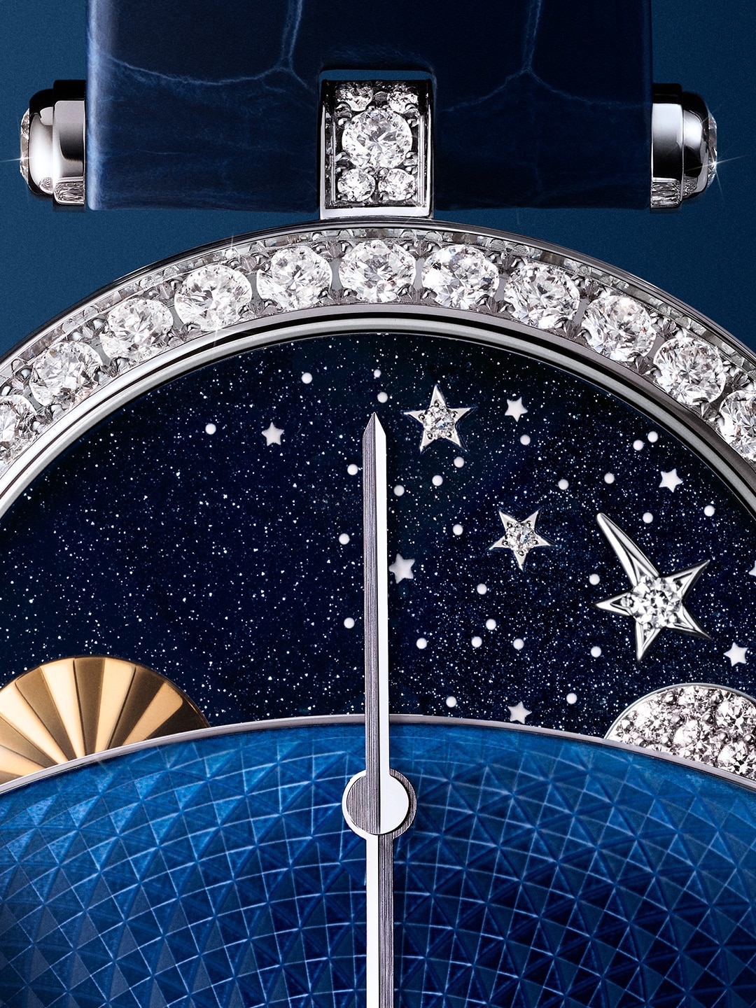 Lady Jour Nuit watch. 18K white gold, 18K yellow gold, blue aventurine, guilloché blue-painted white mother-of-pearl, diamonds. Mechanical self-winding movement equipped with 24h module. Poetic Complications® collection, Van Cleef & Arpels.