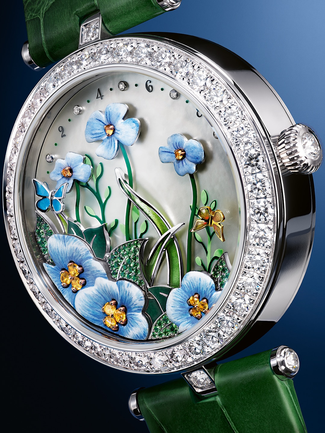 Lady Arpels Brise d'Été watch. 18K white gold, white mother-of-pearl, decal painting, spessartites garnets, tsavorites garnets, enamel miniature painting, vallonné enamel, champlevé enamel, curved plique-à-jour enamel, plique-à-jour enamel, diamonds. Self-winding mechanical movement equipped with a flower breezing and butterfly wandering. Poetic Complications® collection, Van Cleef & Arpels.