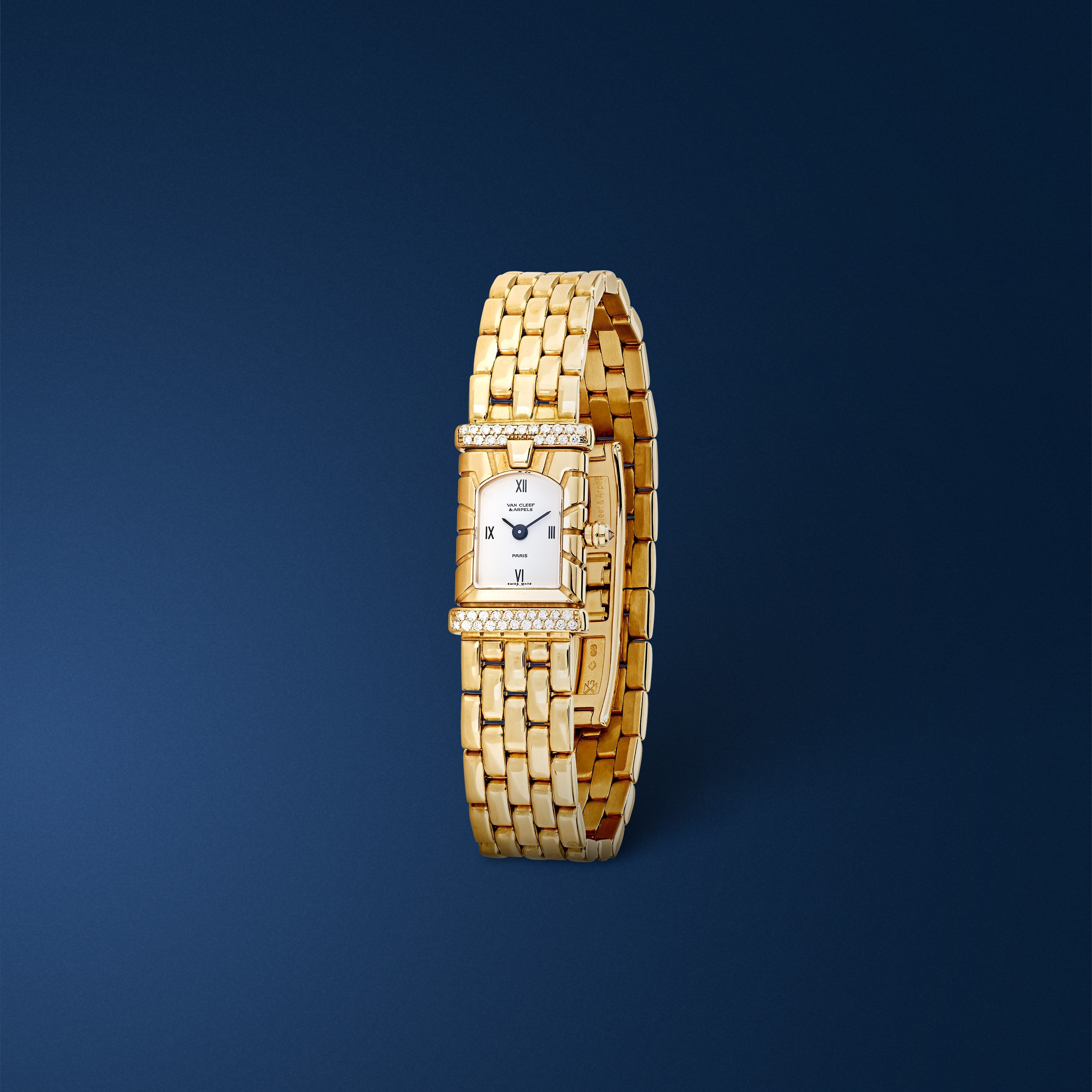 Bracelet montre Façade, 1998. Or jaune, diamants. Collection Van Cleef & Arpels.