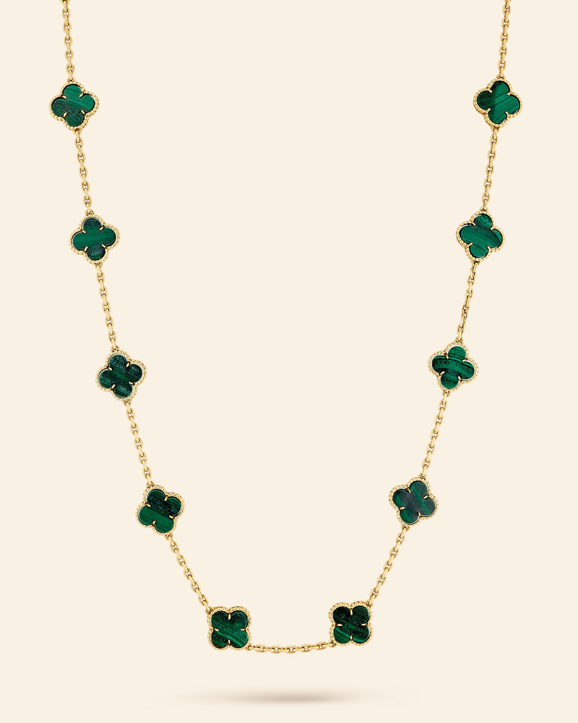 Alhambra long necklace, 1973​. Yellow gold, malachite​. Van Cleef & Arpels Collection​.