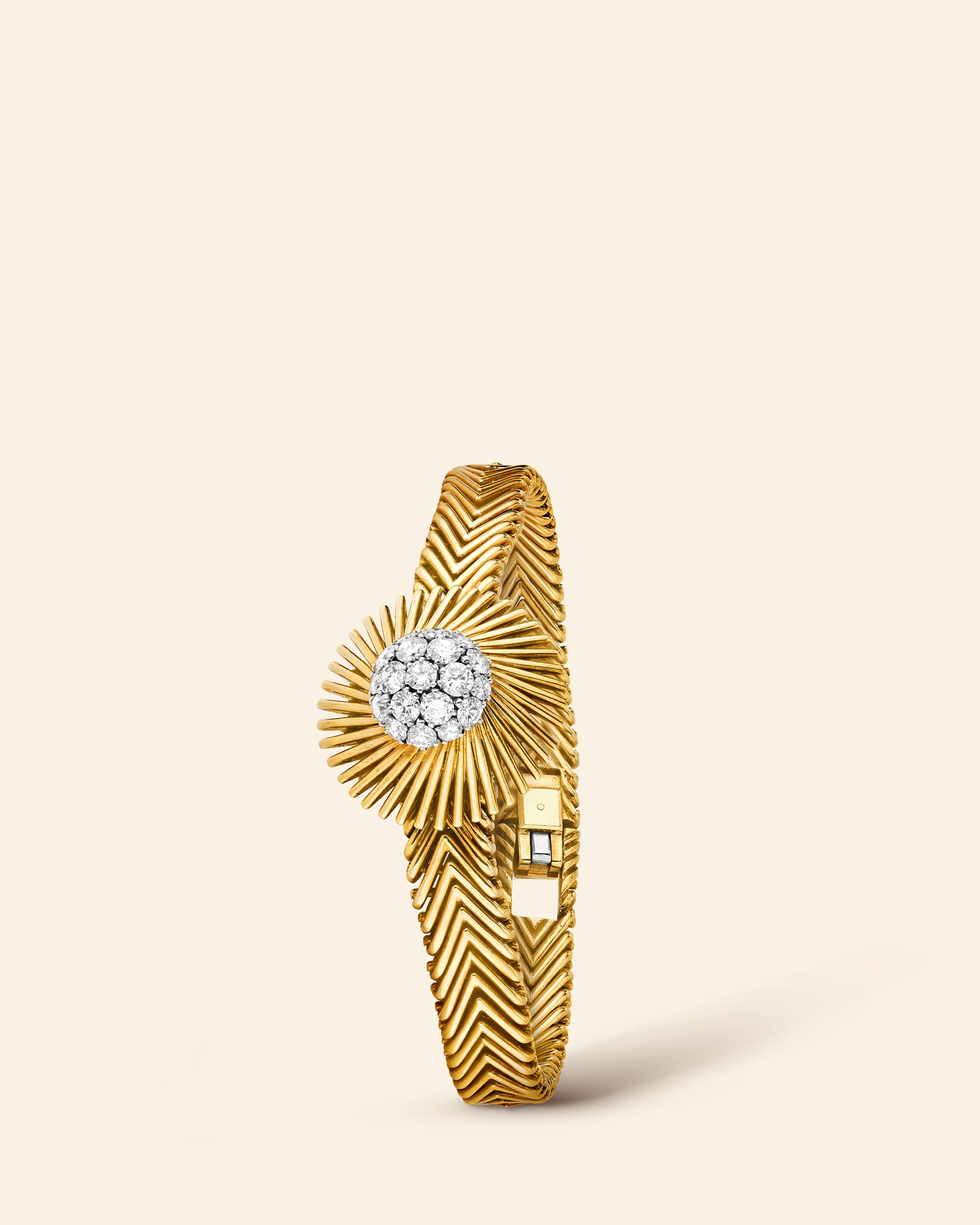 Meteor secret wristwatch, 1959​. Yellow gold, platinum, diamonds​. Van Cleef & Arpels Collection​.