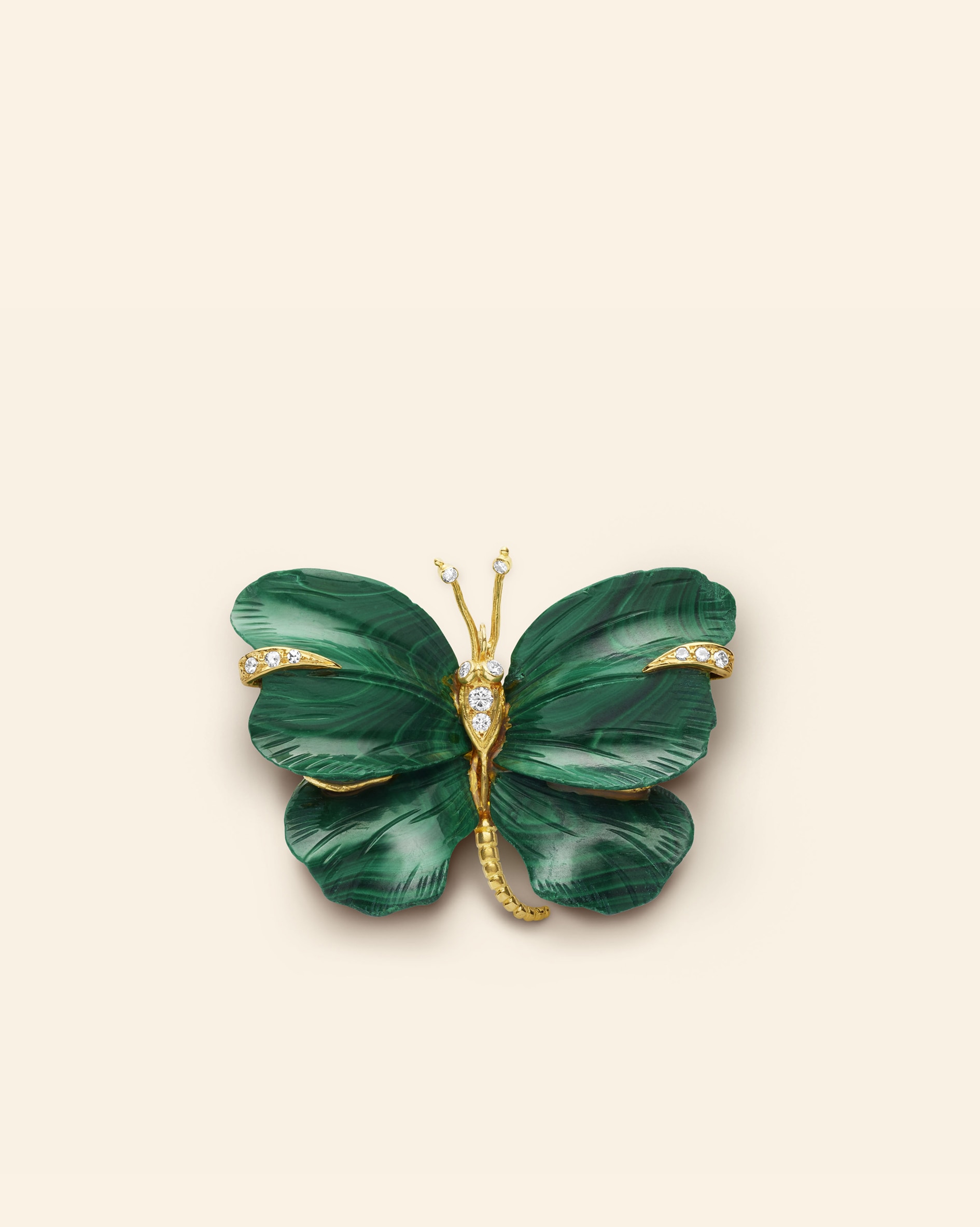Butterfly clip, circa 1971​. Yellow gold, white gold, malachite, diamonds​. Van Cleef & Arpels Collection.