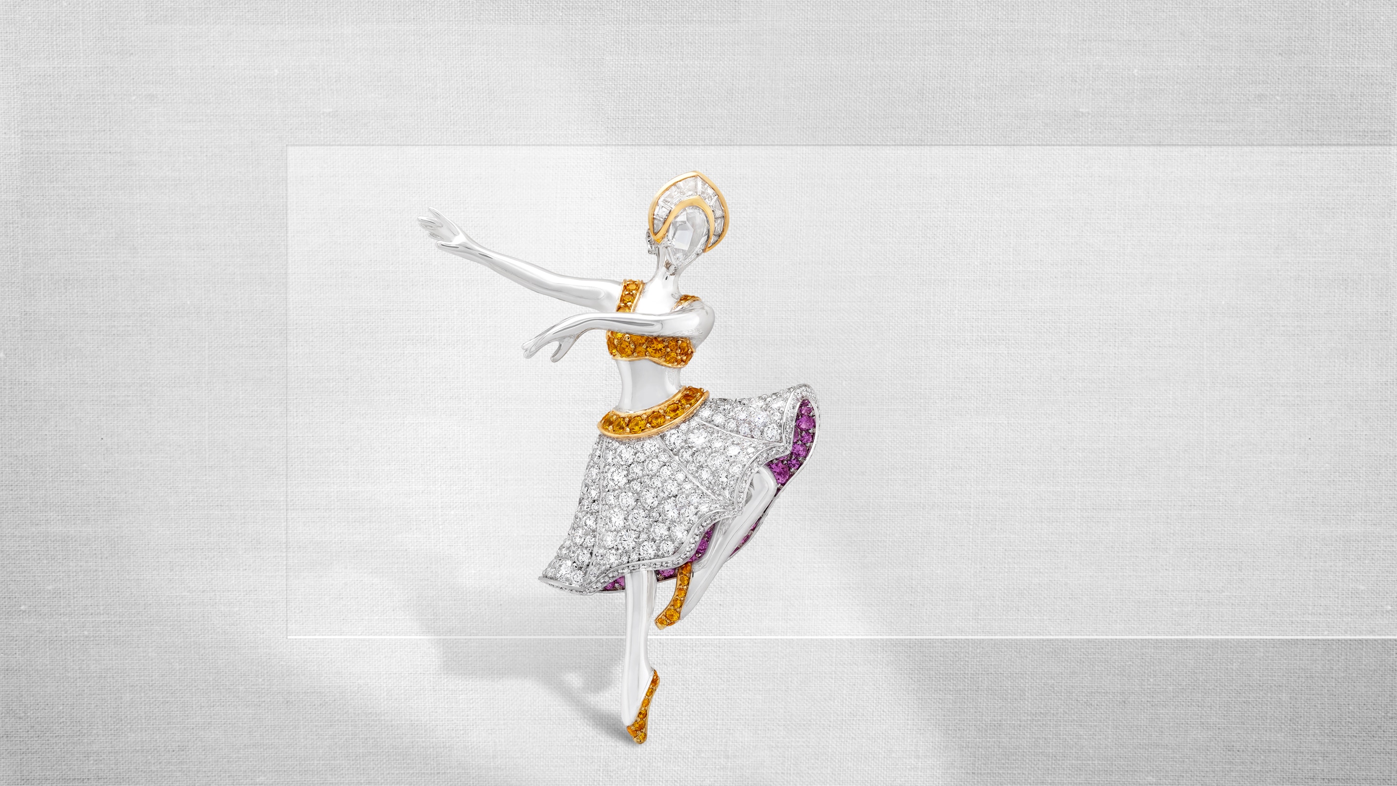 Hedi ballerina clip, white gold, yellow and pink sapphires, diamonds. Feminine figures collection, Van Cleef & Arpels.