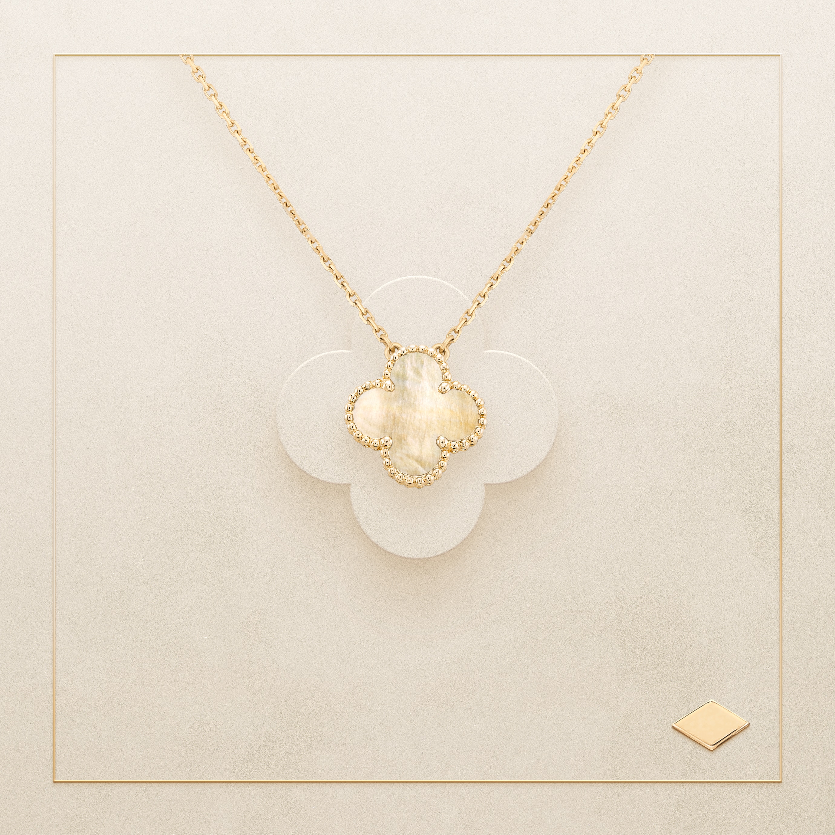 Vintage Alhambra® pendant. Yellow gold, gold mother-of-pearl. Van Cleef & Arpels