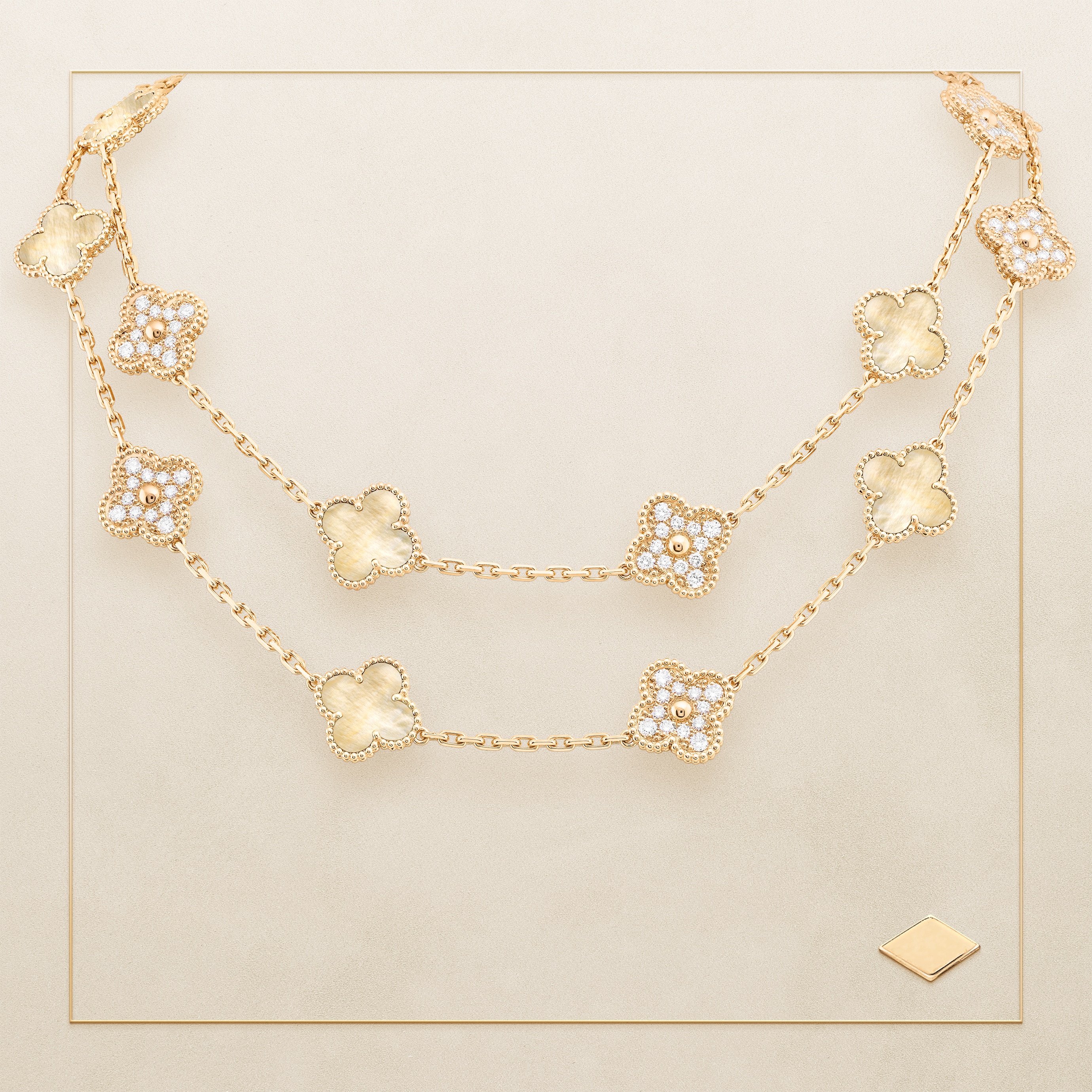 Vintage Alhambra® long necklace, 20 motifs. Yellow gold, gold mother-of-pearl, diamonds. Van Cleef & Arpels