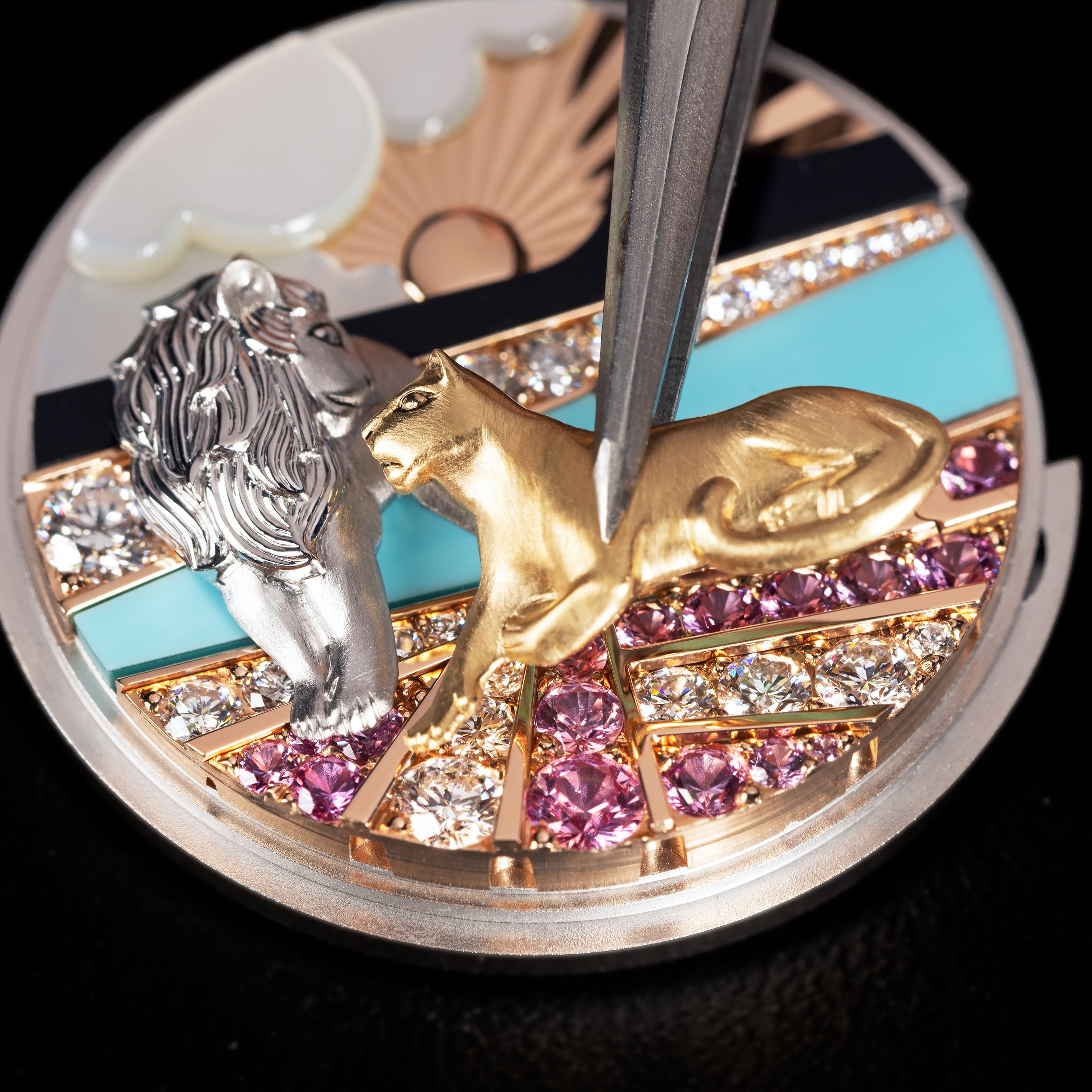 Assembling the yellow gold lioness on the dial with the white gold lion. Lady Duo de Lions watch, Van Cleef & Arpels.