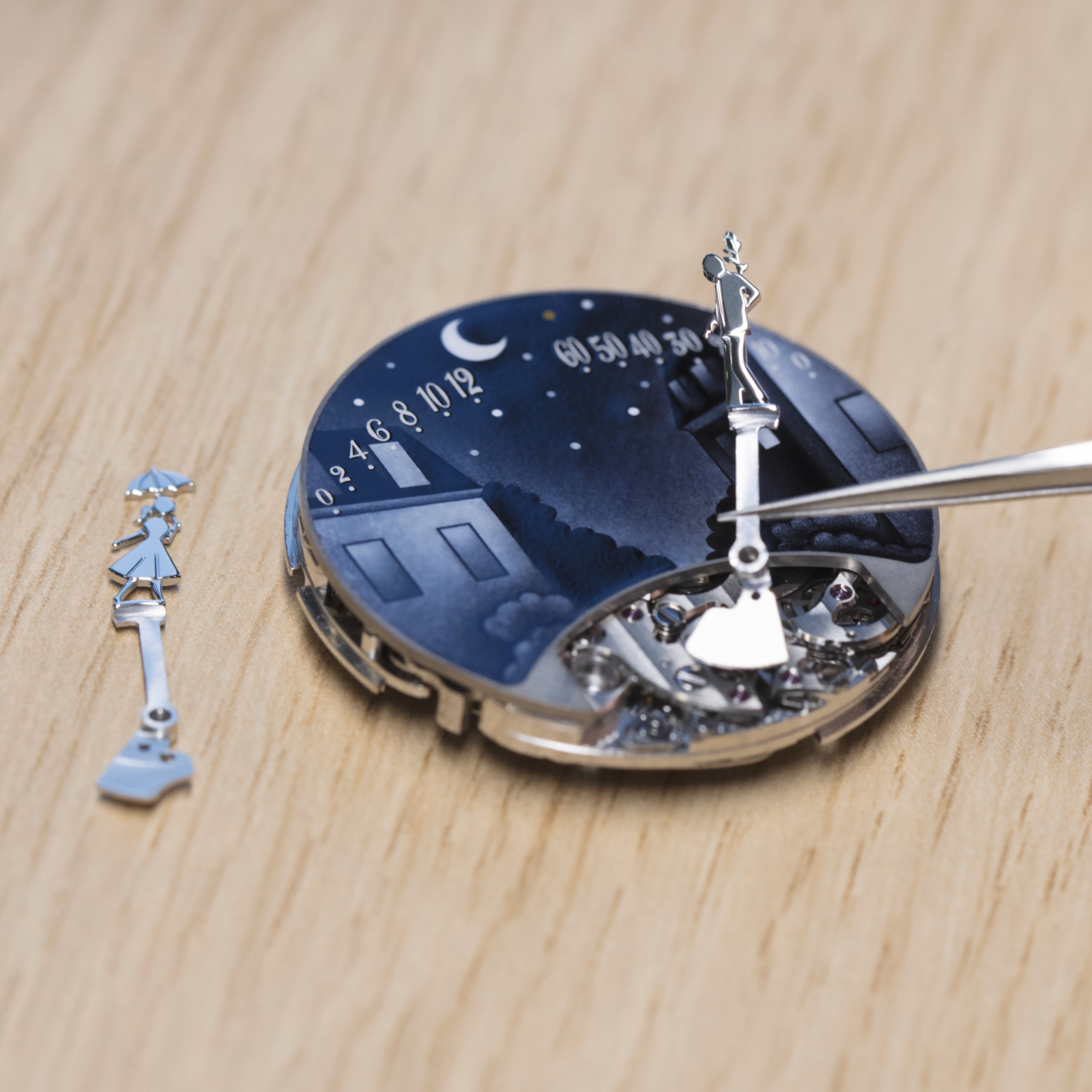 Positioning the hands on the Lady Arpels Pont des Amoureux Nuit watch. Van Cleef & Arpels Collection.