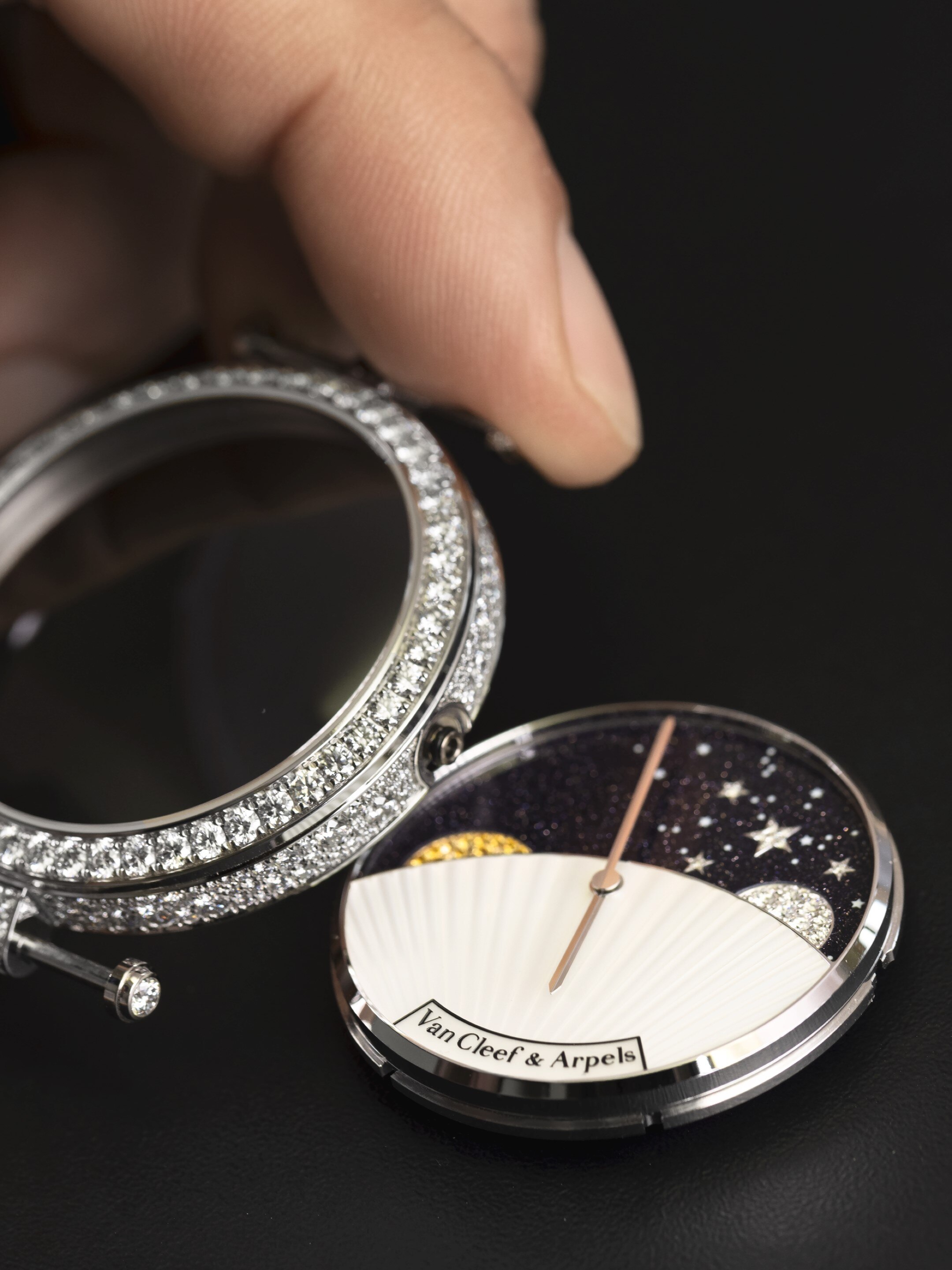 Lady Arpels Jour Nuit watch, white gold, diamonds, yellow sapphires, mother-of-pearl and aventurine. Poetic Complications collection, Van Cleef & Arpels.