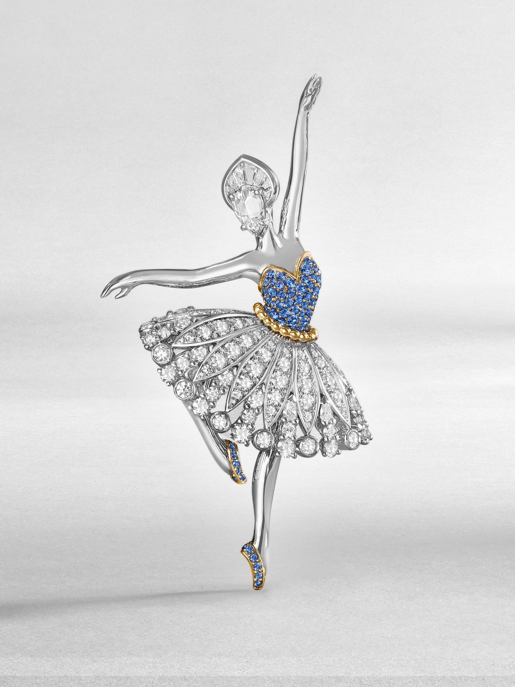 Léonore ballerina clip. White gold, yellow gold, sapphires, diamonds. High Jewelry collection, Van Cleef & Arpels.