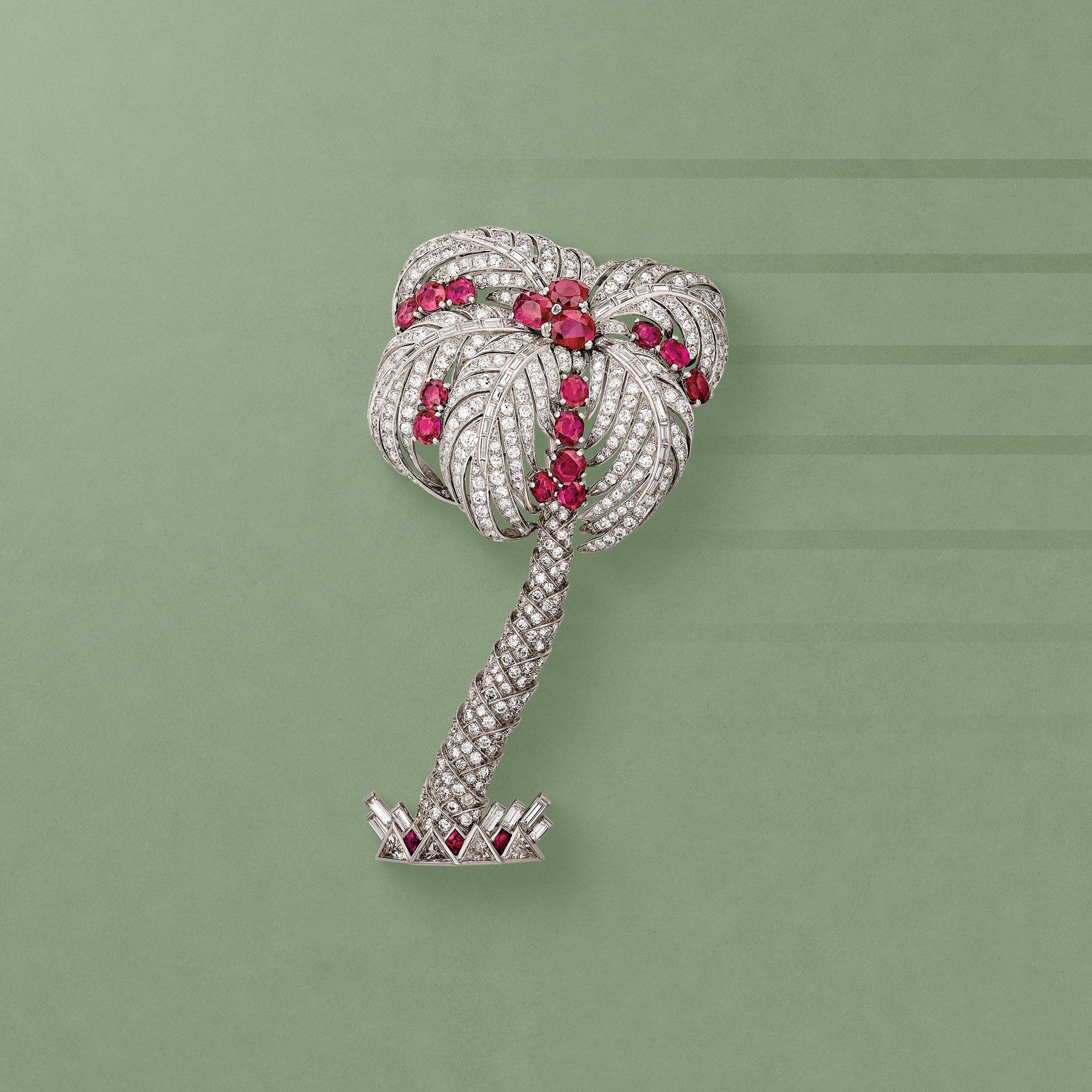 Palm Tree clip, 1941. Detachable clip. Platinum, 18K white gold, rubies, diamonds. Van Cleef & Arpels Collection.