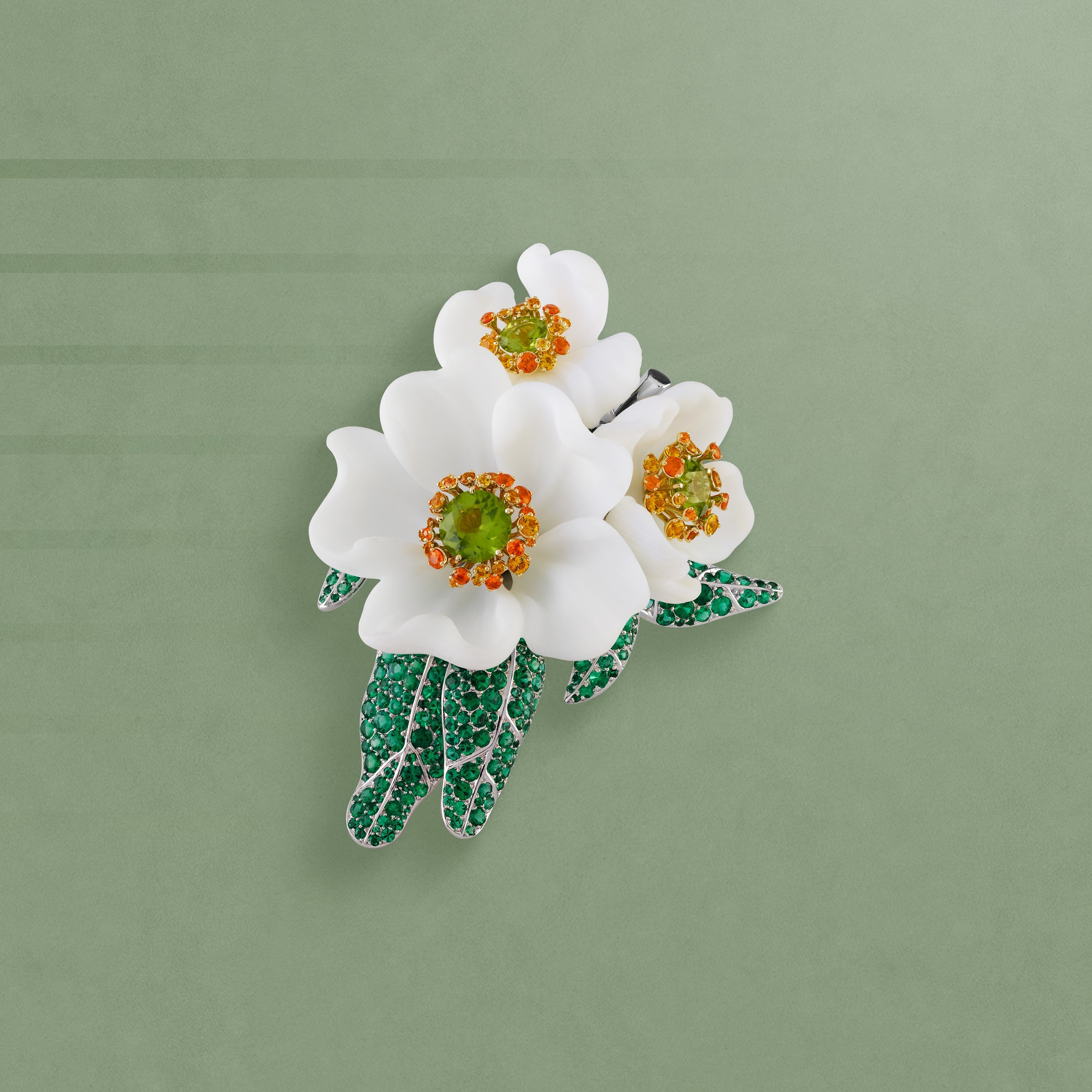 Carpenteria clip, 2009. Platinum, 18K yellow gold, emeralds, yellow sapphires, garnets, white opals, peridots. California Rêverie™ High Jewelry Collection. Van Cleef & Arpels Collection.
