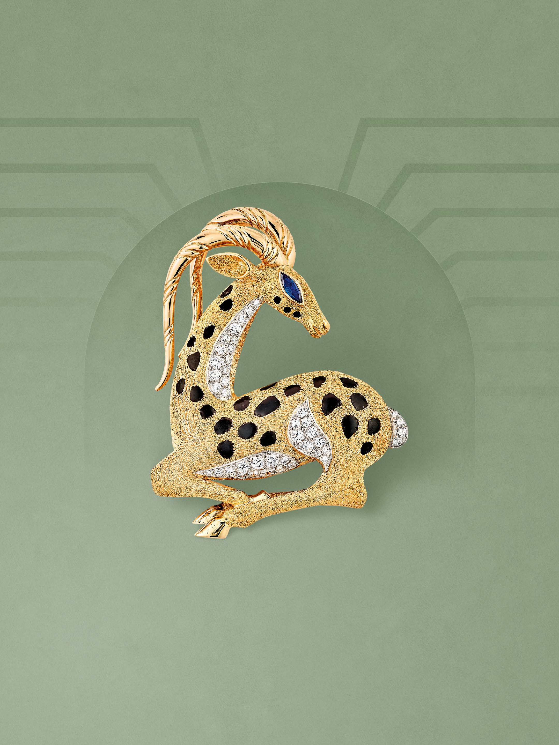 Antelope clip, 1972. Platinum, 18K yellow gold, sapphire, enamel, diamonds. Van Cleef & Arpels Collection.