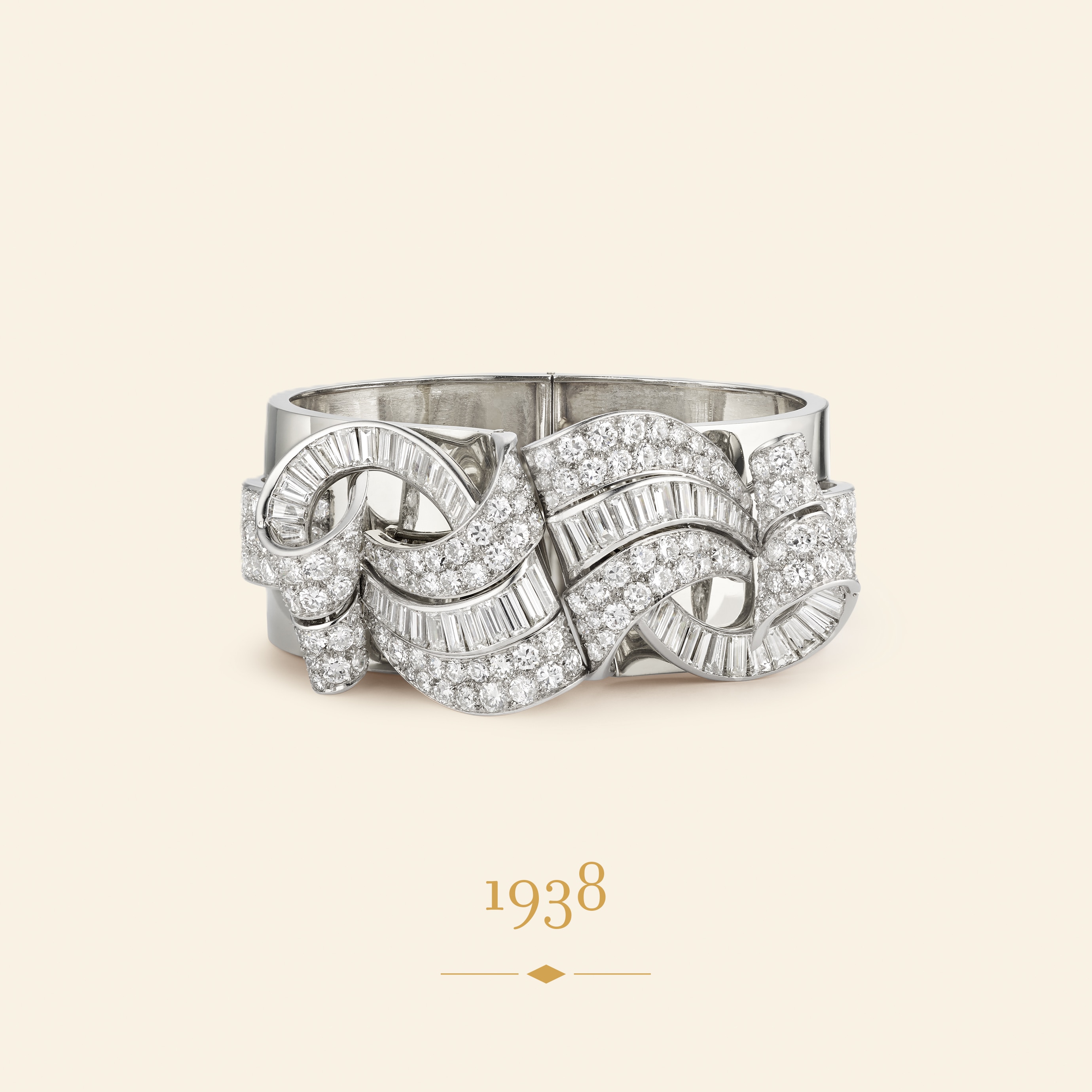 Bracelet, 1938. Convertible into two clips. Platinum, diamonds. Van Cleef & Arpels Collection.