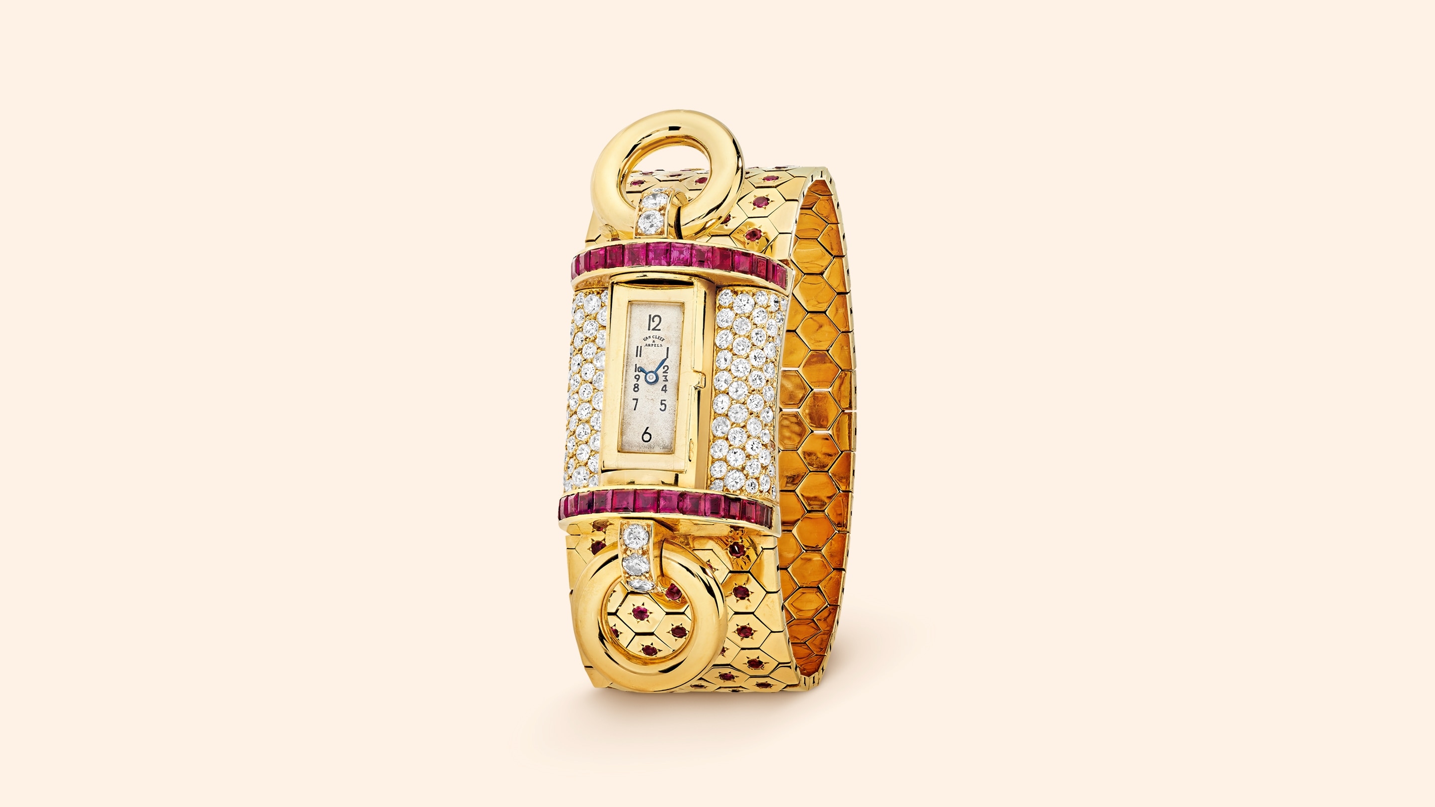 Armbanduhr Ludo Tourniquet, 1937. 18 Karat Gelbgold, Rubine, Diamanten. Sammlung Van Cleef & Arpels.