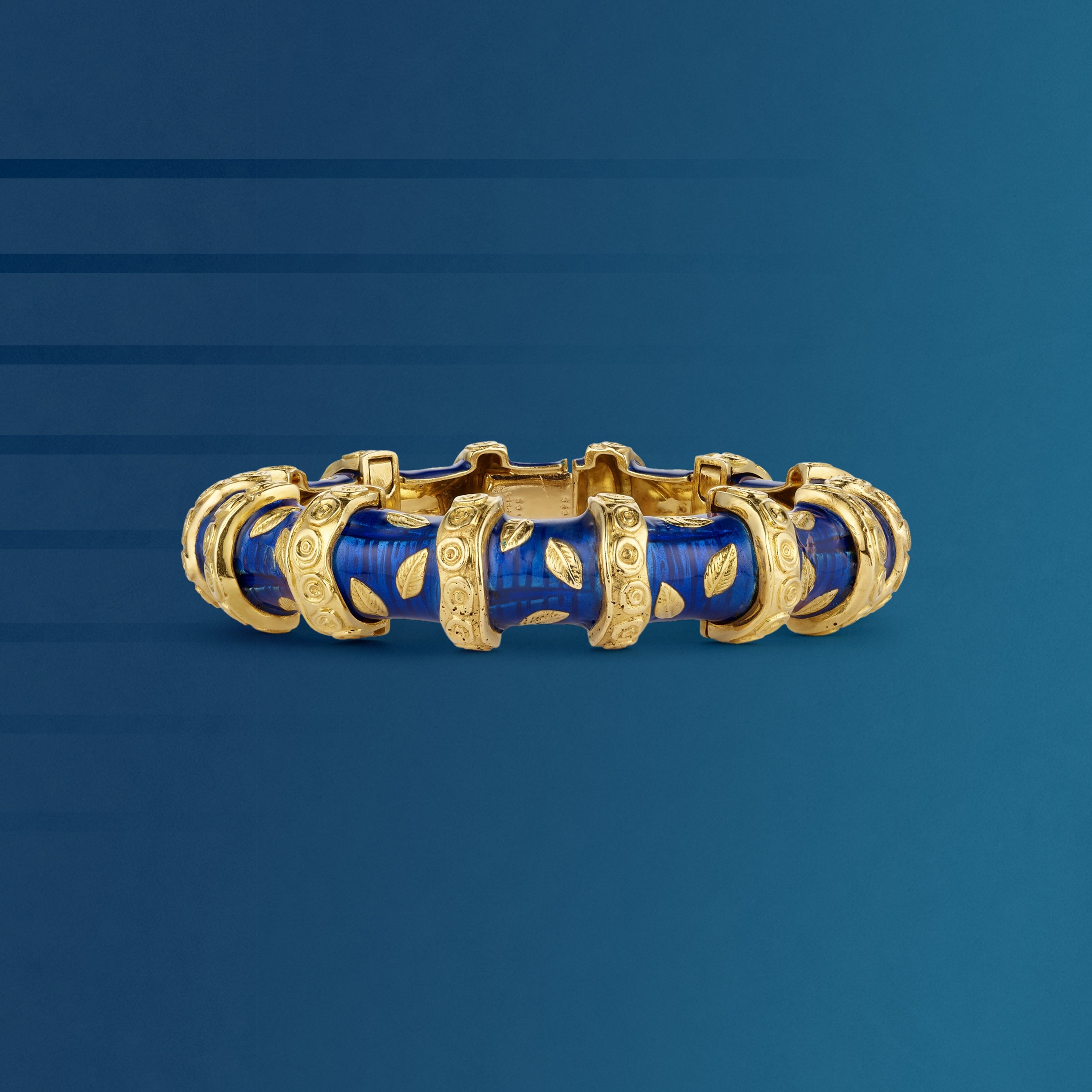 Bamboo bracelet, 1965. 18K yellow gold, enamel. Van Cleef & Arpels Collection.