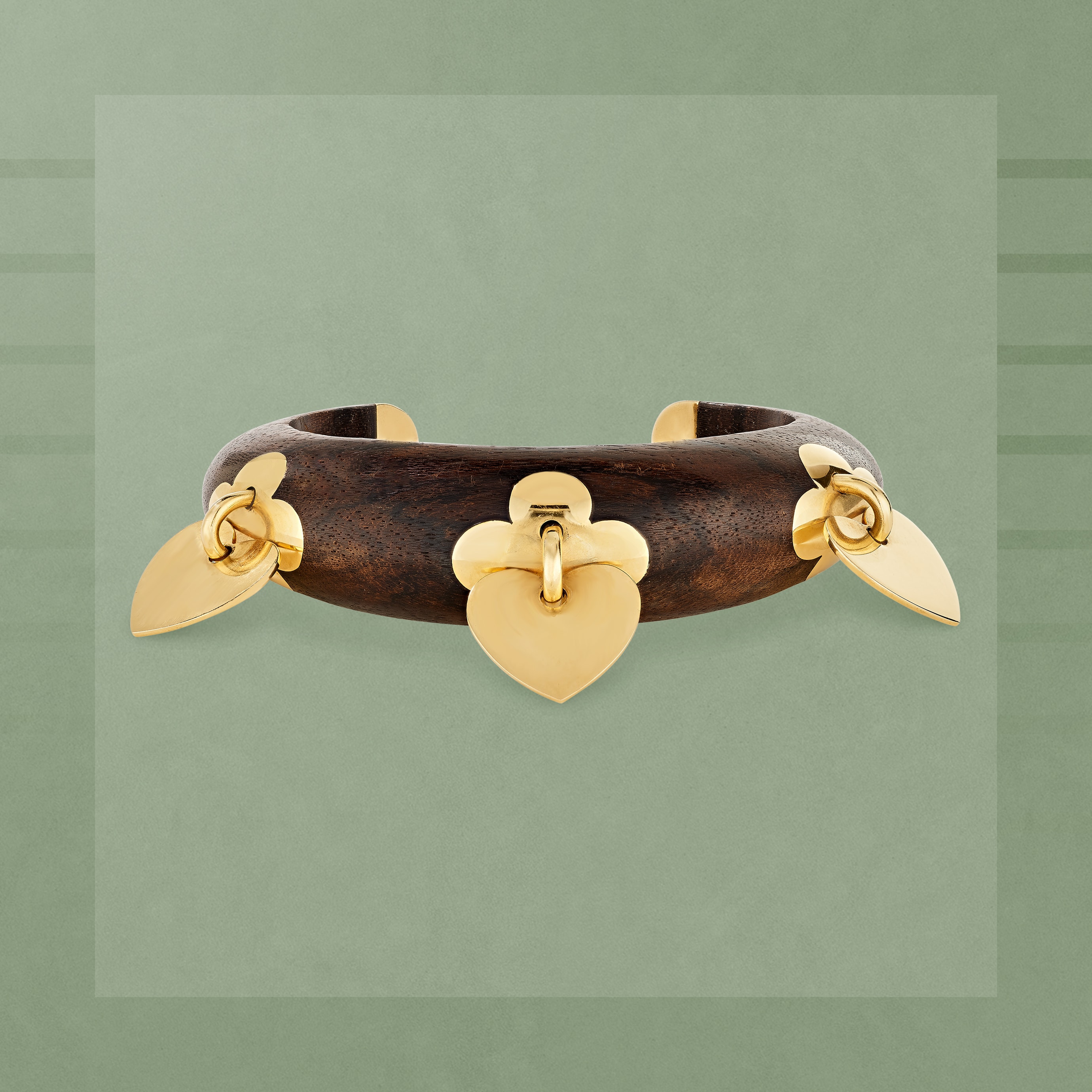 Sylvestre bracelet, circa 1997. Yellow gold, wood. Van Cleef & Arpels Collection.