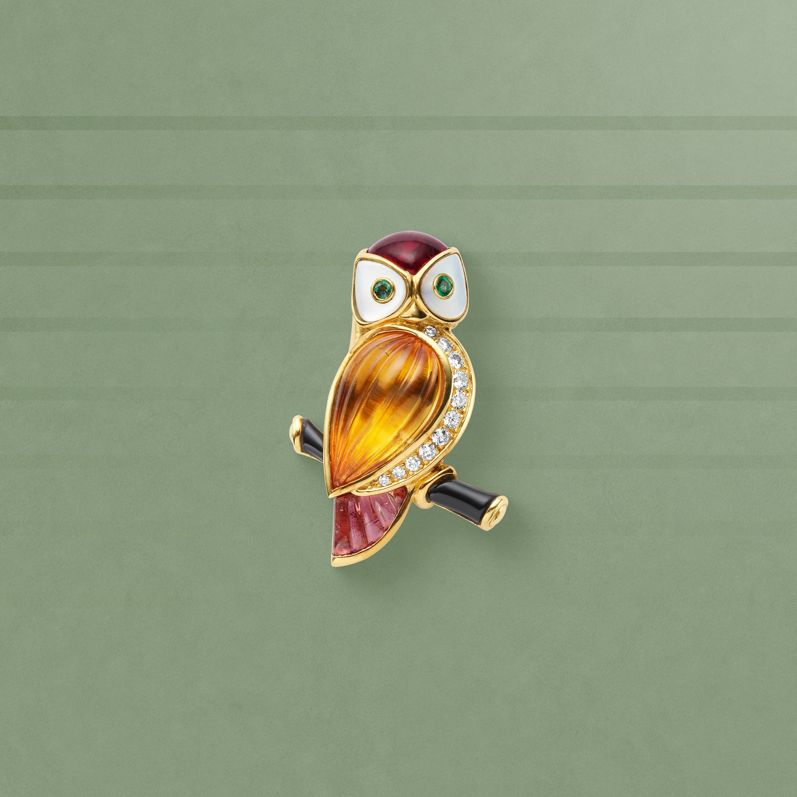 Owl clip, 1994. Yellow gold, emeralds, citrine, tourmalines, white mother-of-pearl, enamel, diamonds. Van Cleef & Arpels Collection.